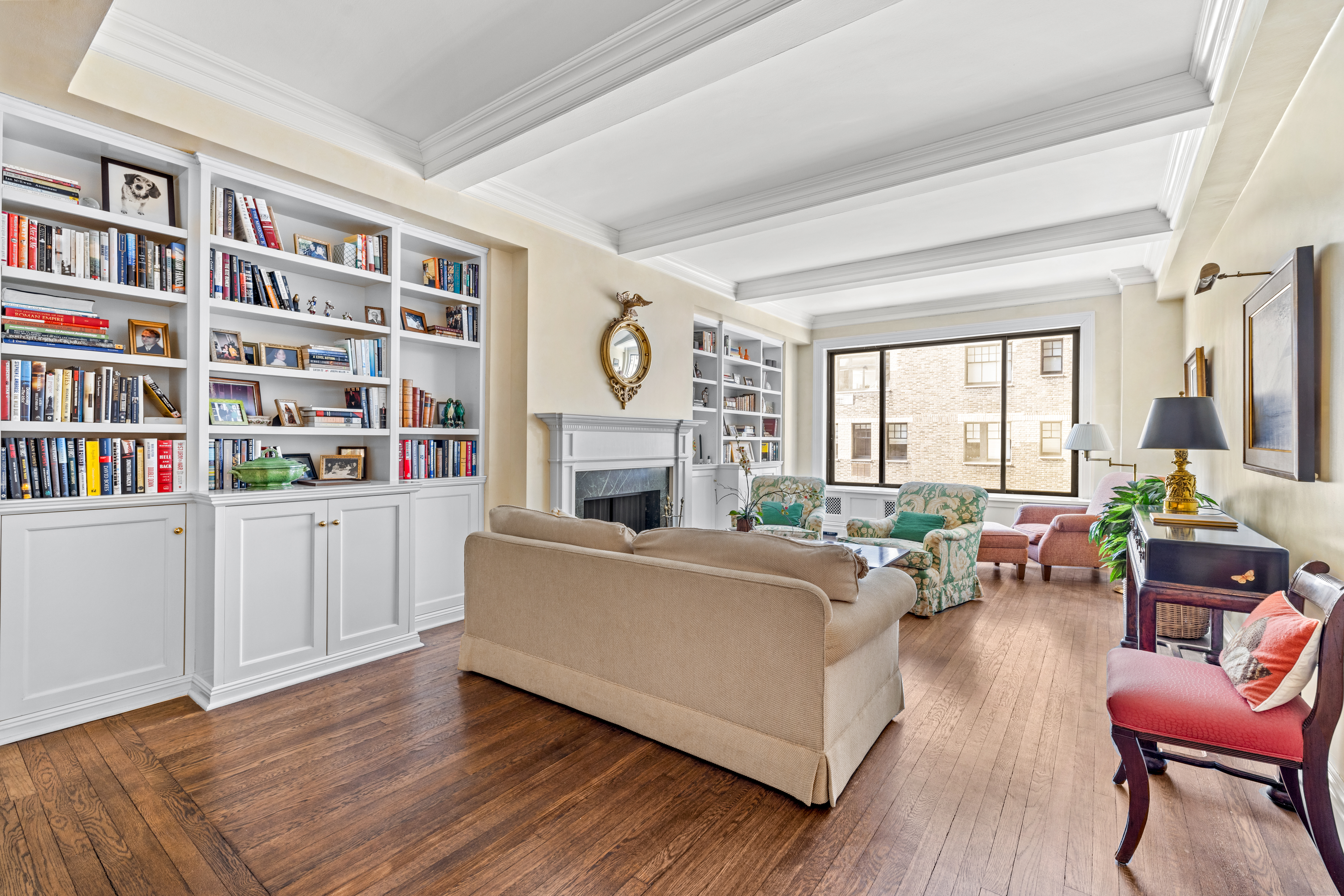 75 Central Park West, Unit 5A Manhattan, NY 10023 - Photo 4 of 14 a living room with furniture and a fireplace