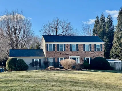 a view of a house with a swimming pool