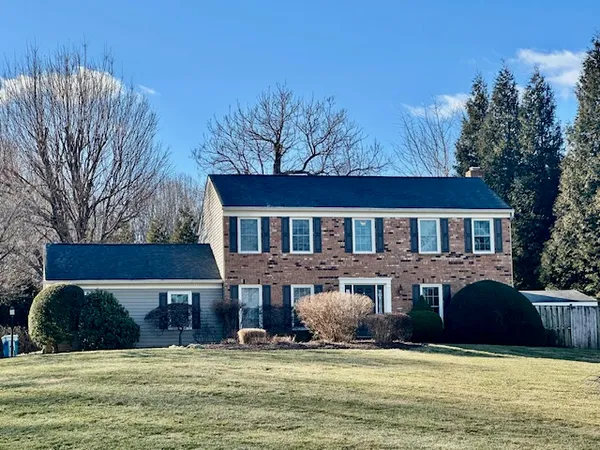 a view of a house with a swimming pool