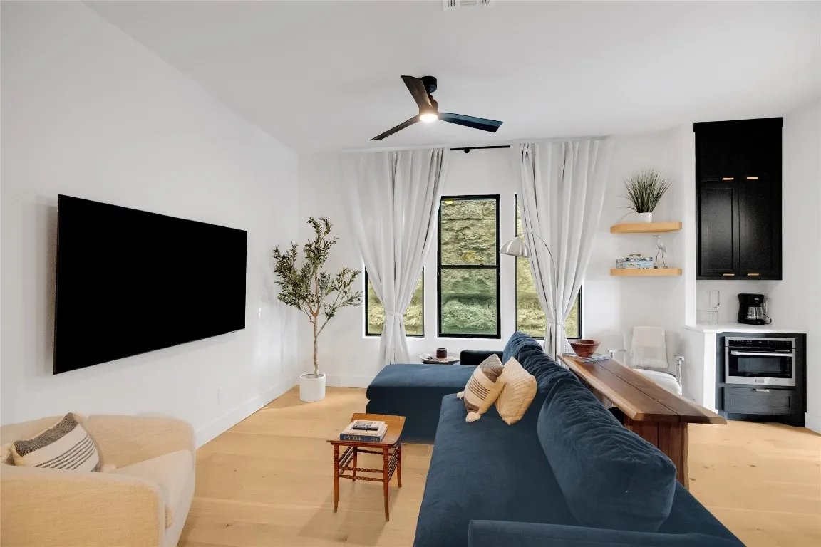 a view of dining room and kitchen with a sink
