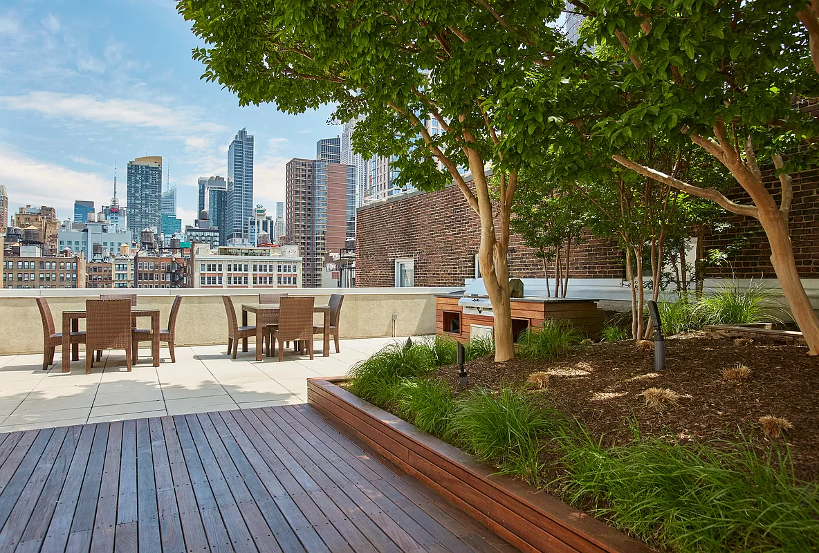 133 West 22nd Street, Unit 12B Manhattan, NY 10011 - Photo 9 of 12 a view of a city with sitting area