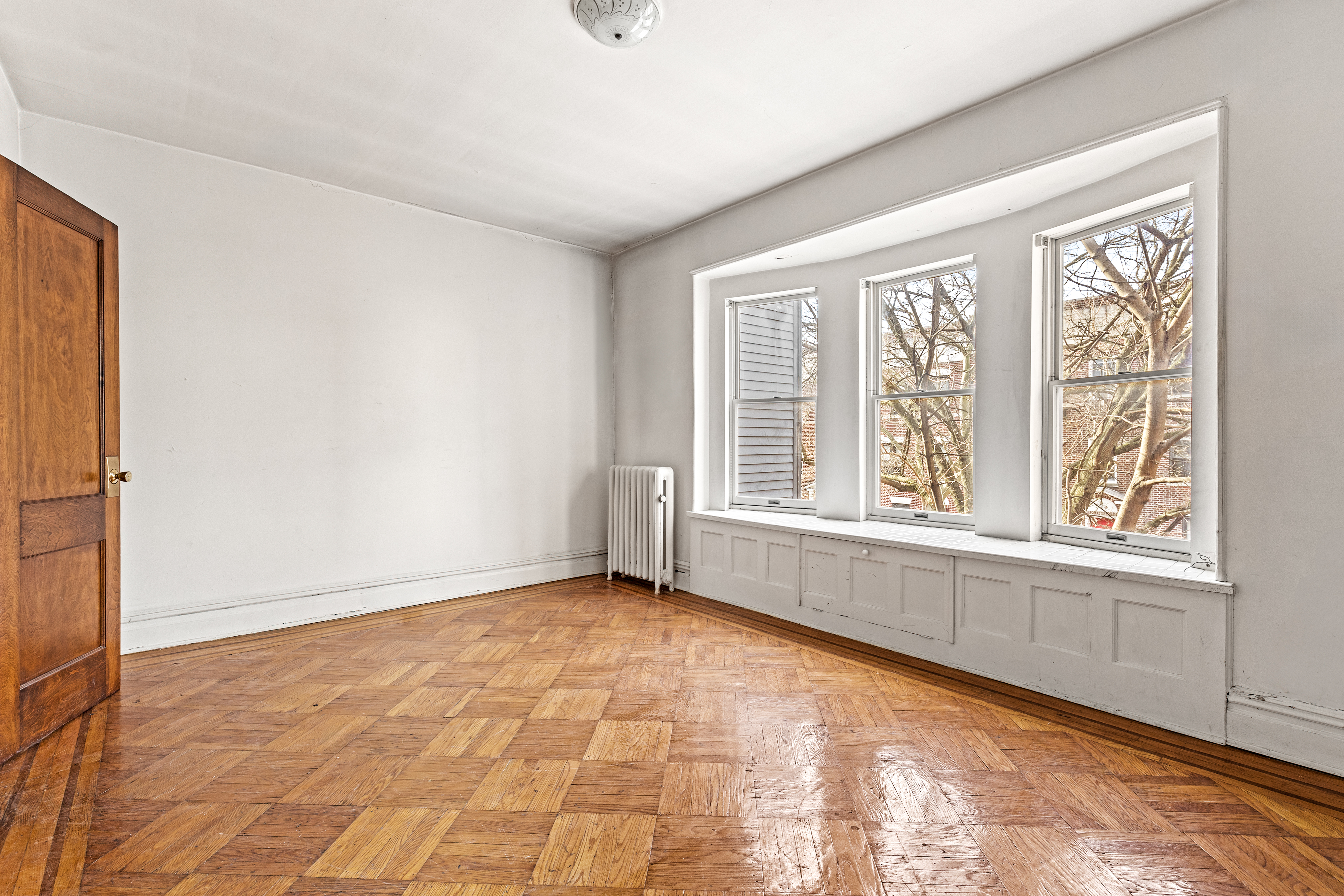 555 16th Street Brooklyn, NY 11215 - Photo 11 of 19 an empty room with windows