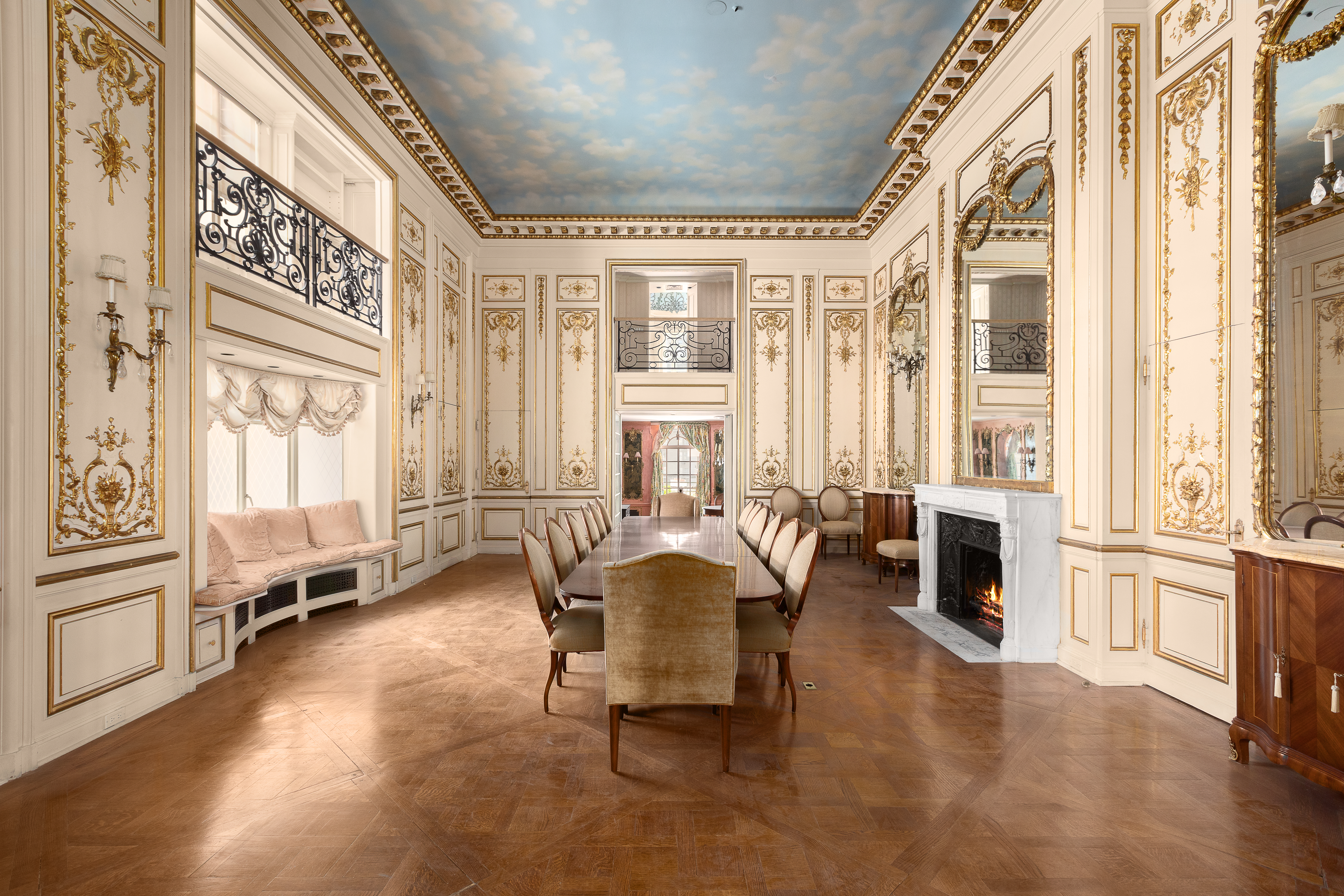 1 East 62nd Street, Unit PH Manhattan, NY 10065 - Photo 4 of 13 a living room with furniture and a large window