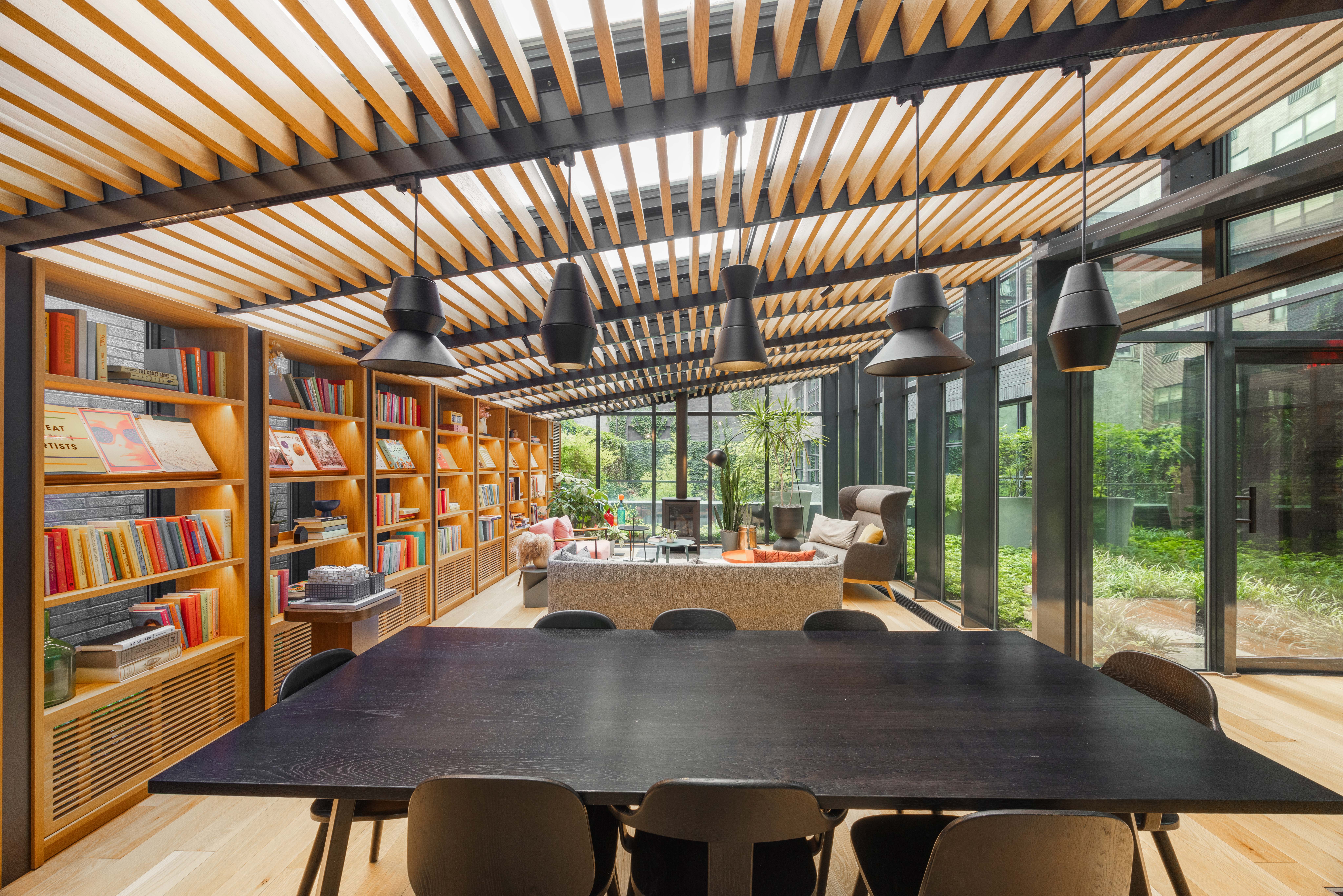 547 West 47th Street, Unit 509 Manhattan, NY 10036 - Photo 15 of 29 a view of a dining room with furniture window and outside view
