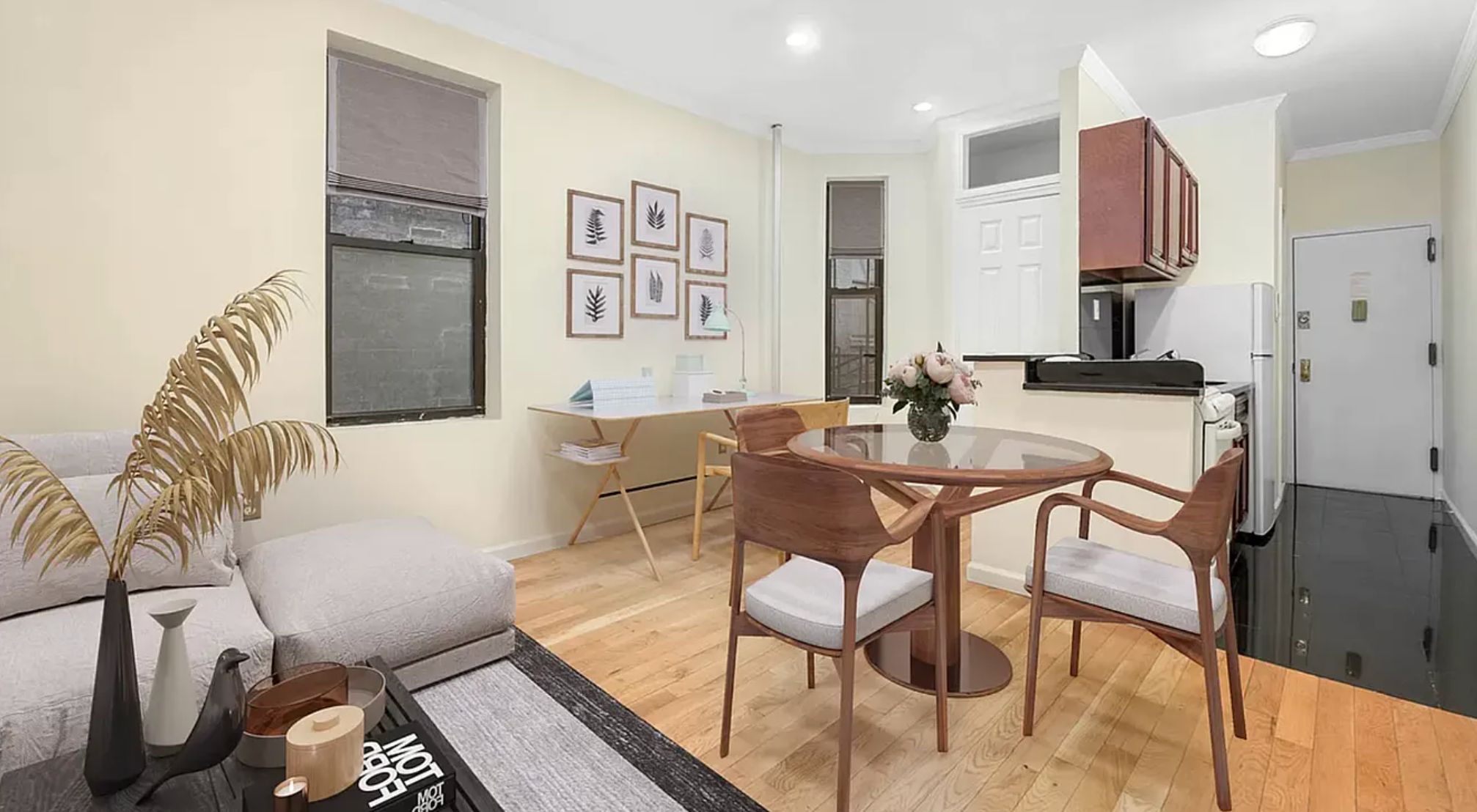 370 Columbus Avenue, Unit 4F Manhattan, NY 10024 - Photo 2 of 13 a view of a dining room with furniture and wooden floor