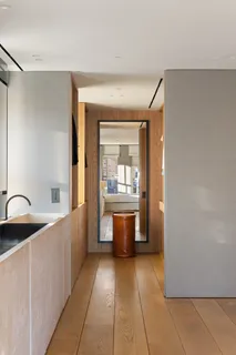 a kitchen with stainless steel appliances a sink and cabinets