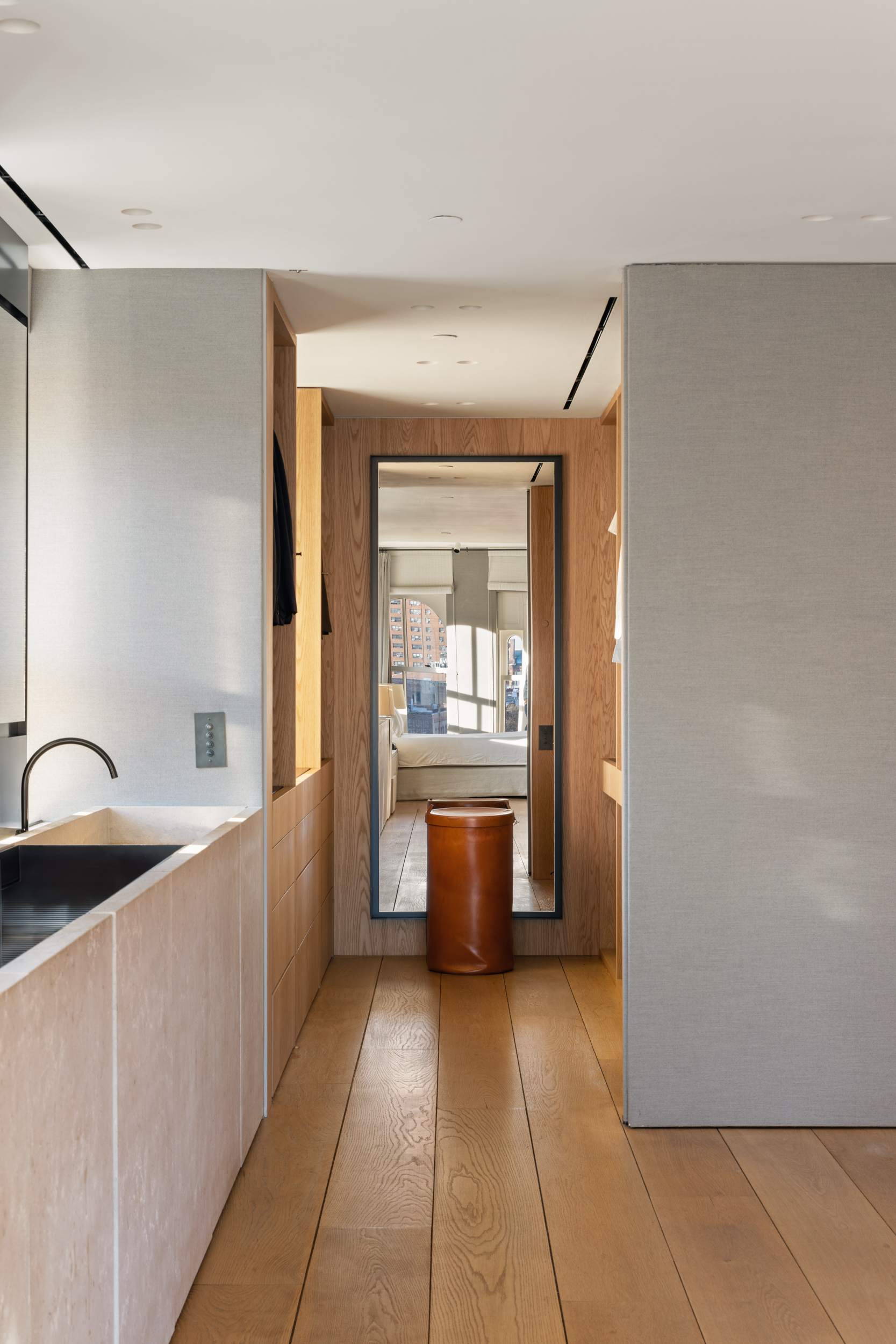 54 Bond Street, Unit PH Manhattan, NY 10012 - Photo 16 of 31 a kitchen with stainless steel appliances a sink and cabinets