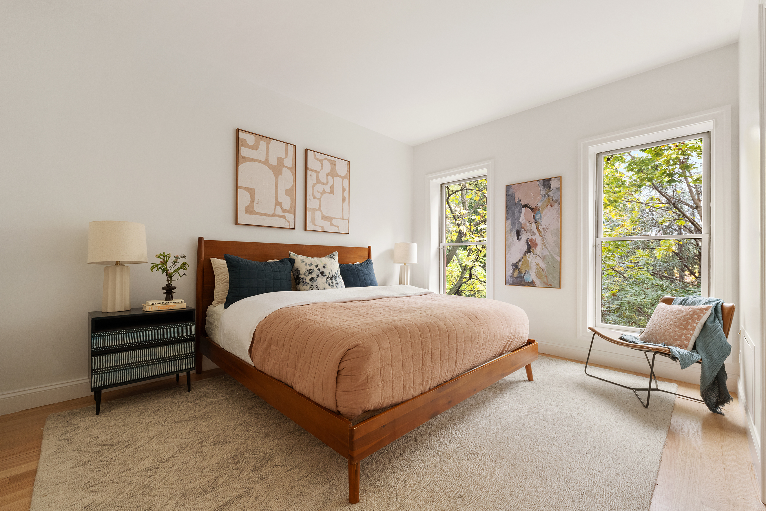 221 Prospect Place Brooklyn, NY 11238 - Photo 6 of 16 a bedroom with a bed and a couch next to a window