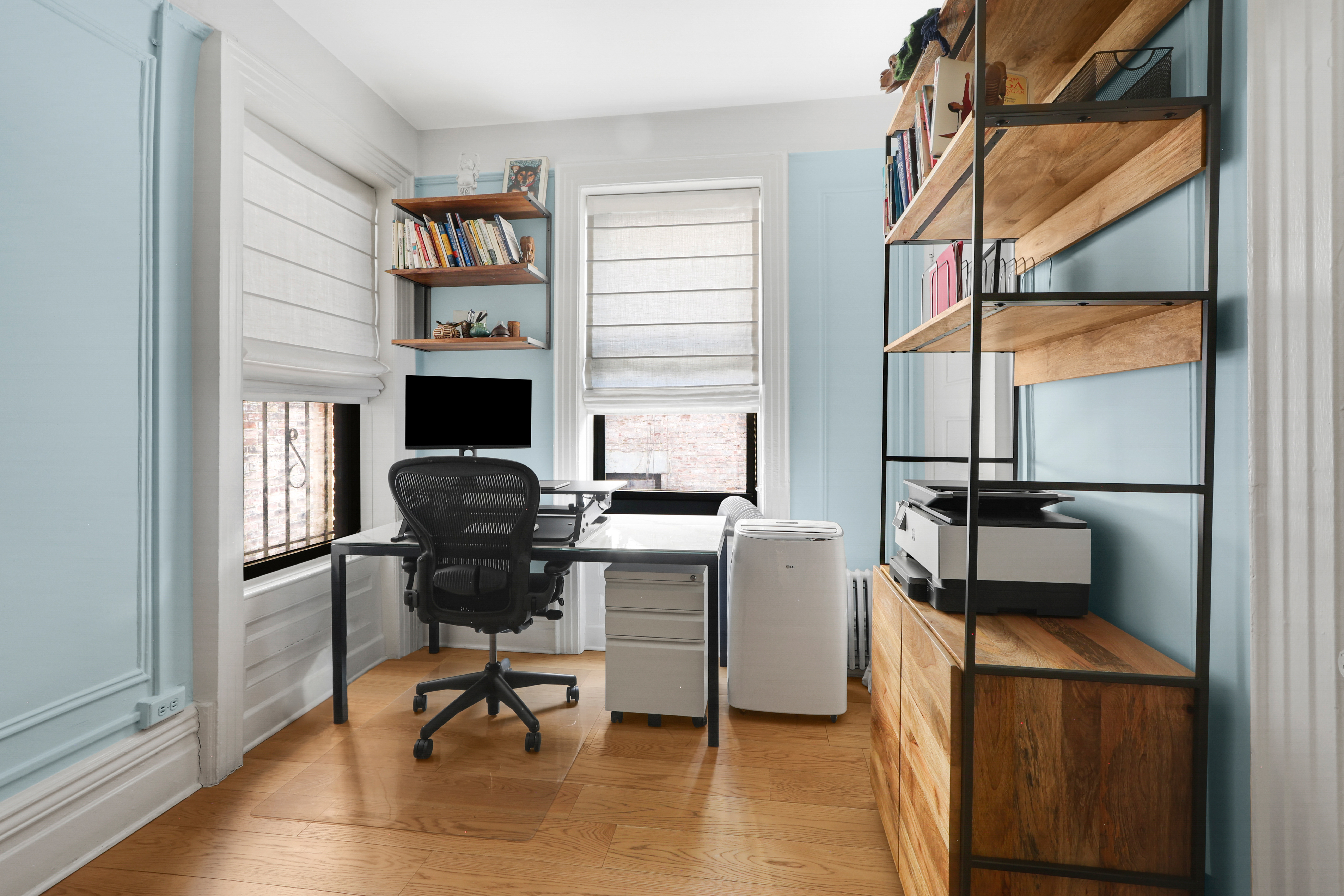 311 West 97th Street, Unit 6E Manhattan, NY 10025 - Photo 14 of 18 a work room with furniture and a window