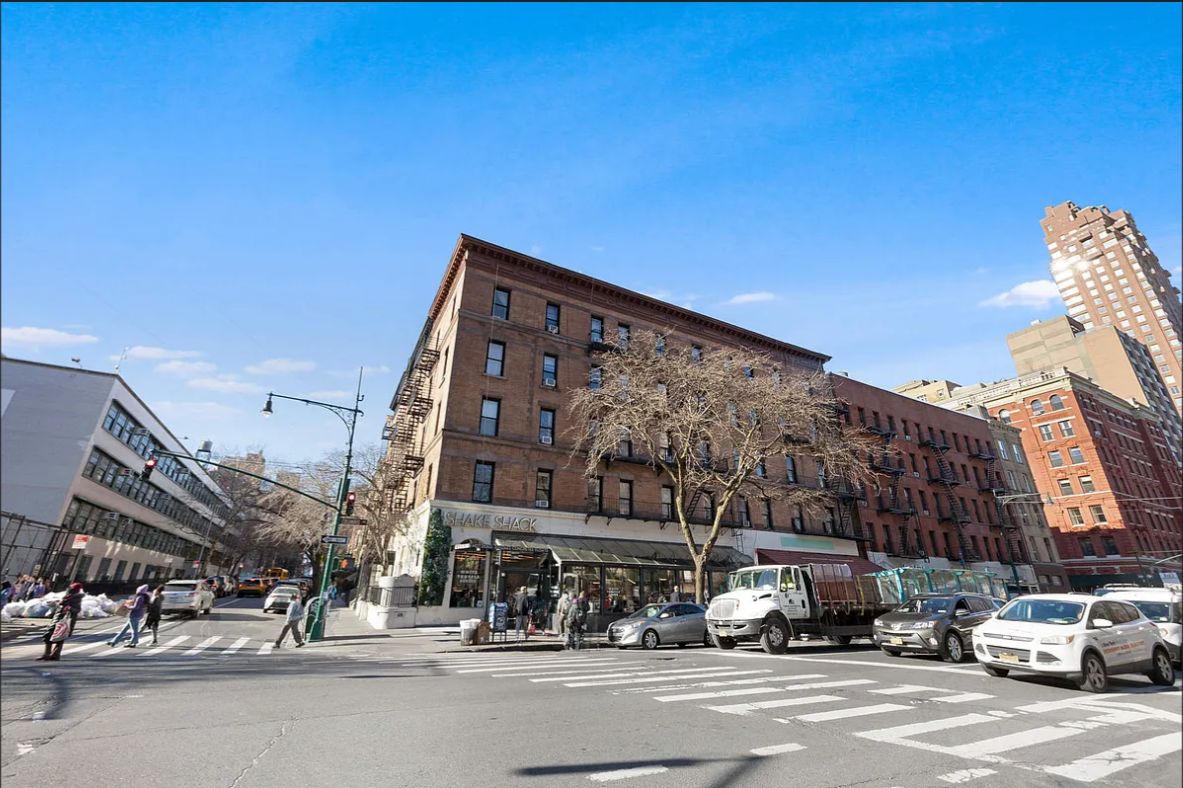 370 Columbus Avenue, Unit 2J Manhattan, NY 10024 - Photo 7 of 9 a view of a building and car parked on the road