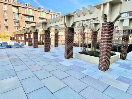 a view of swimming pool from a balcony