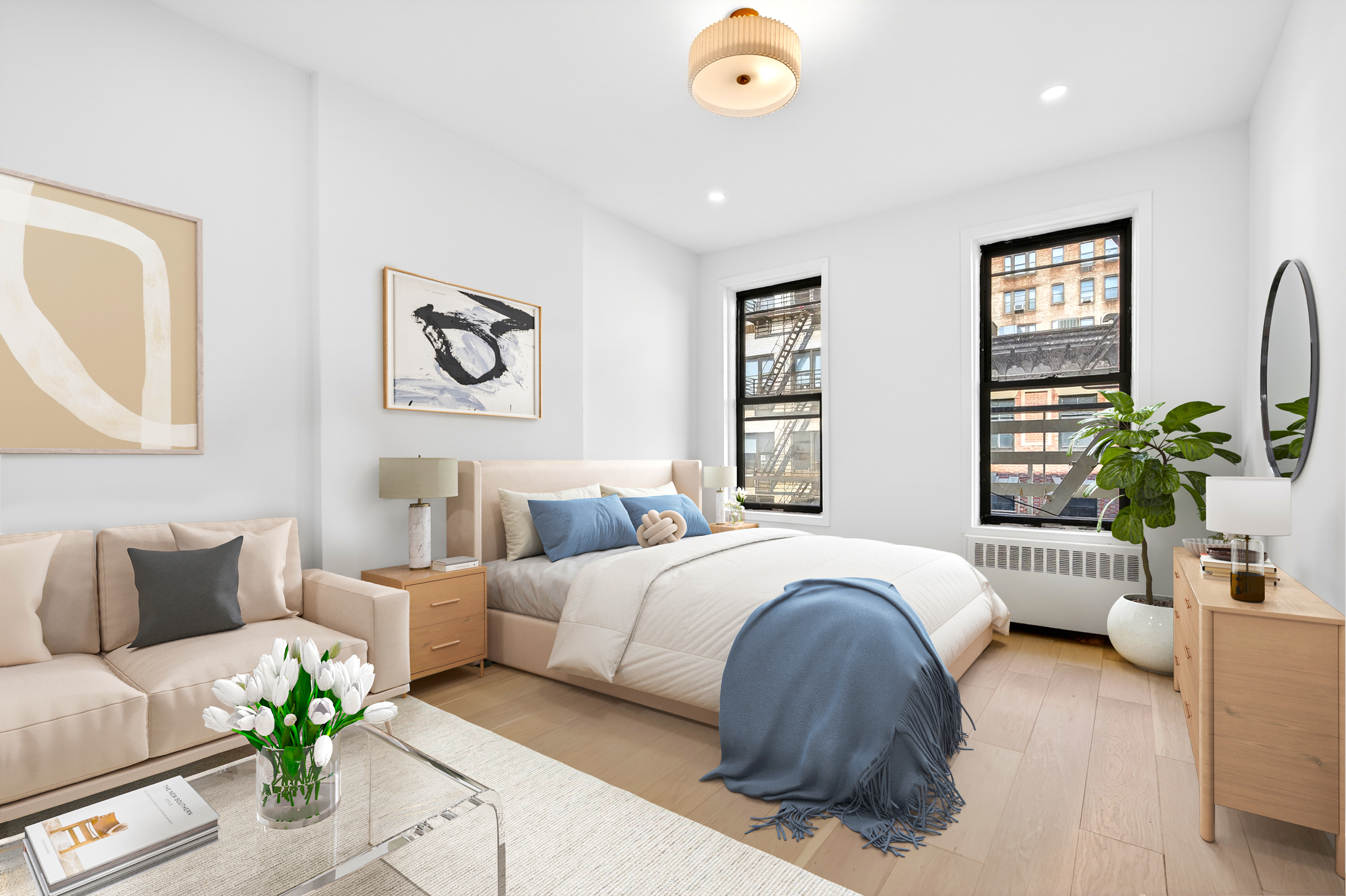 a spacious bedroom with a bed and a couch