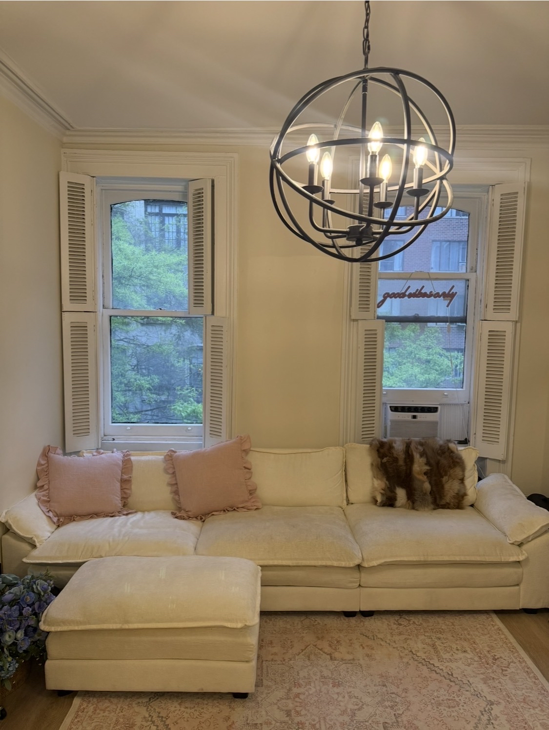 114 East 37th Street, Unit 3A Manhattan, NY 10016 - Photo 1 of 15 a living room with furniture and a chandelier