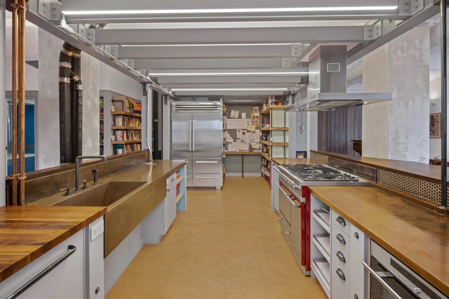 a kitchen with a stove and a sink