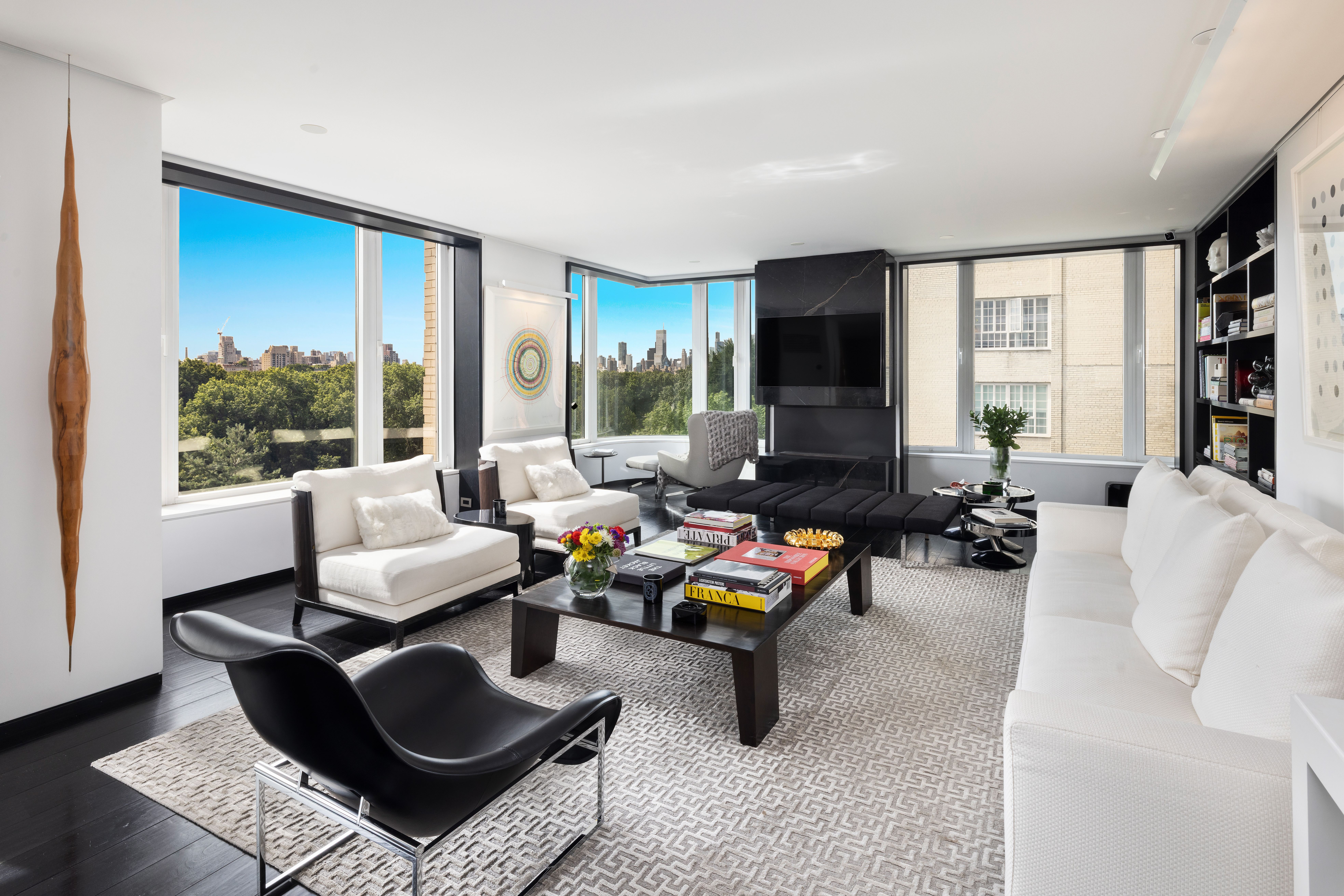 279 Central Park West, Unit 8BC Manhattan, NY 10024 - Photo 7 of 20 a living room with furniture and a flat screen tv