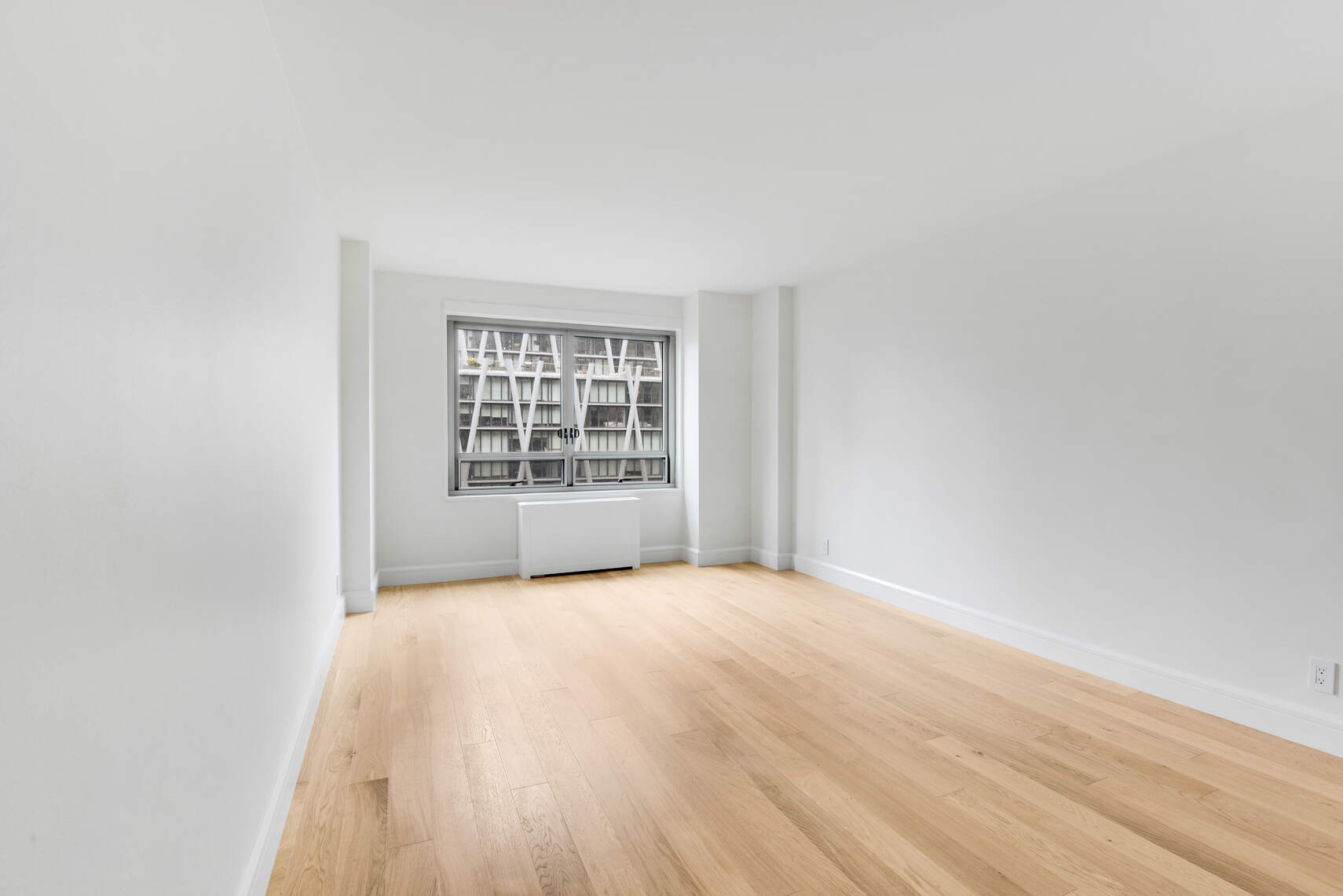 170 West End Avenue, Unit 12B Manhattan, NY 10023 - Photo 8 of 15 a view of an empty room with a window