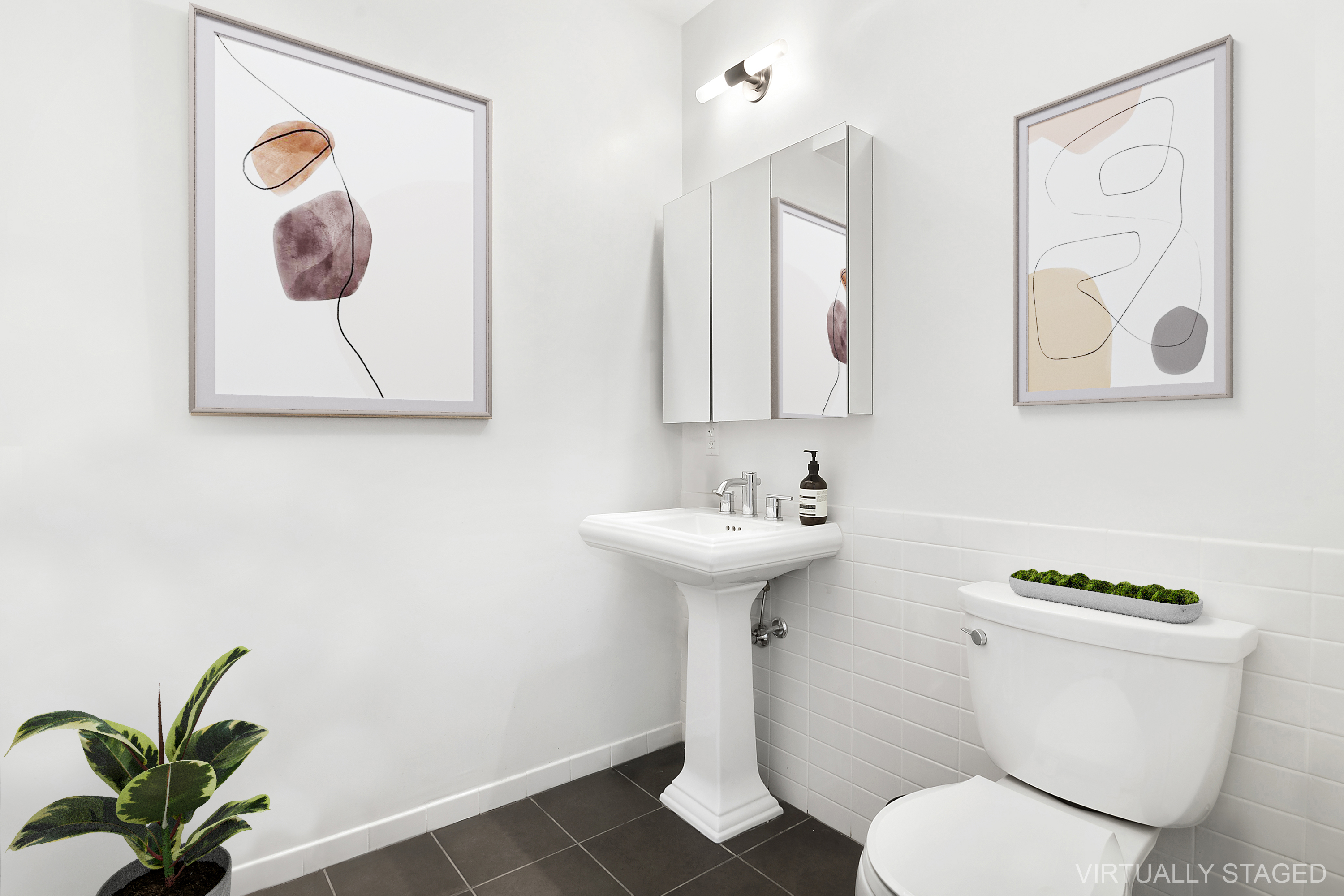 365 Bridge Street, Unit 15K Brooklyn, NY 11201 - Photo 8 of 9 a bathroom with a toilet sink and mirror