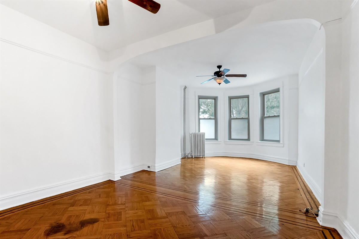 829 Caton Avenue, Unit 2 Brooklyn, NY 11218 - Photo 1 of 3 a view of an empty room with window