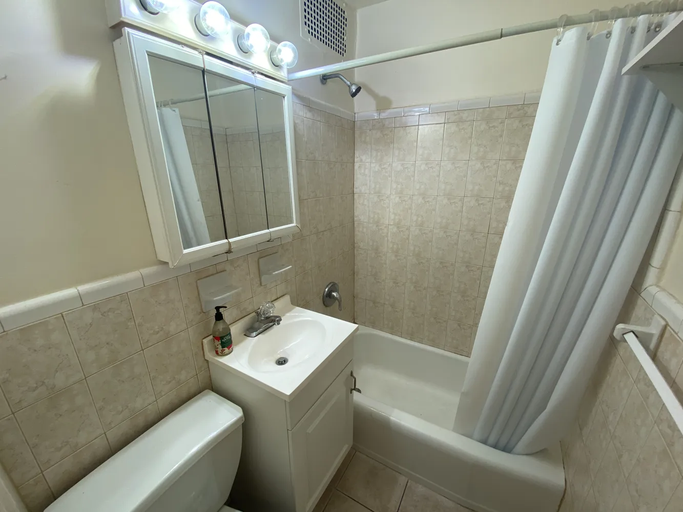 a bathroom with a sink and a toilet