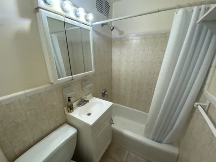 a bathroom with a sink and a toilet