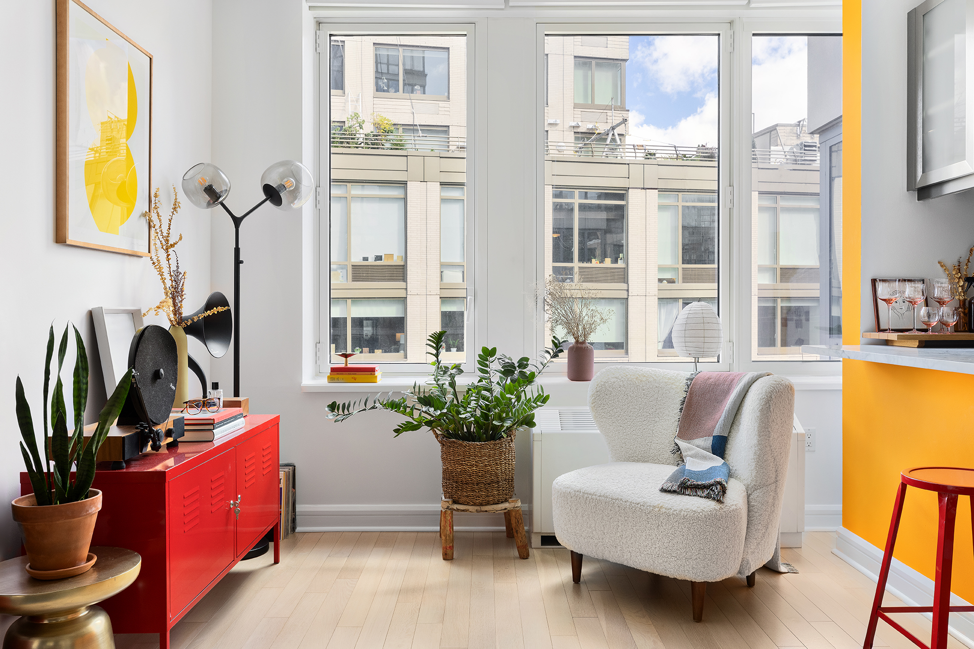 80 Riverside Boulevard, Unit 12D Manhattan, NY 10069 - Photo 4 of 16 a living room with furniture fireplace and a large window