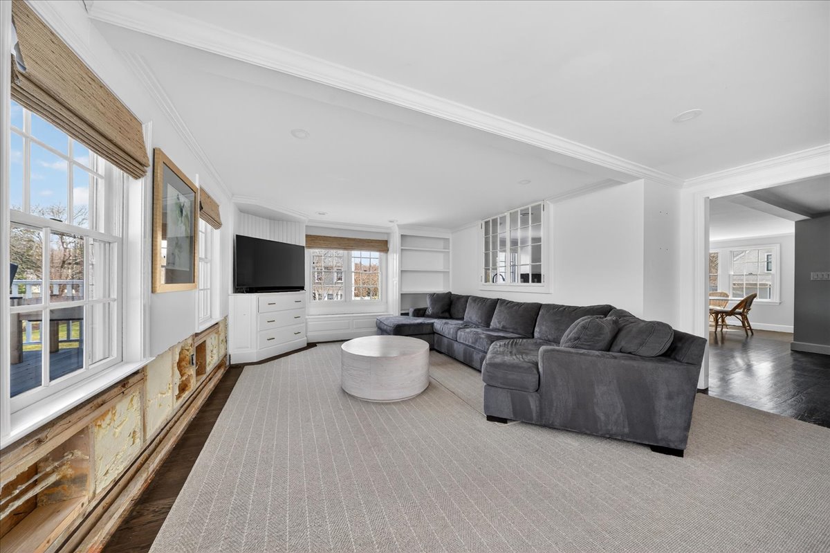 6 Studley Road Hingham, MA 02043 - Photo 12 of 27 a living room with furniture and a flat screen tv