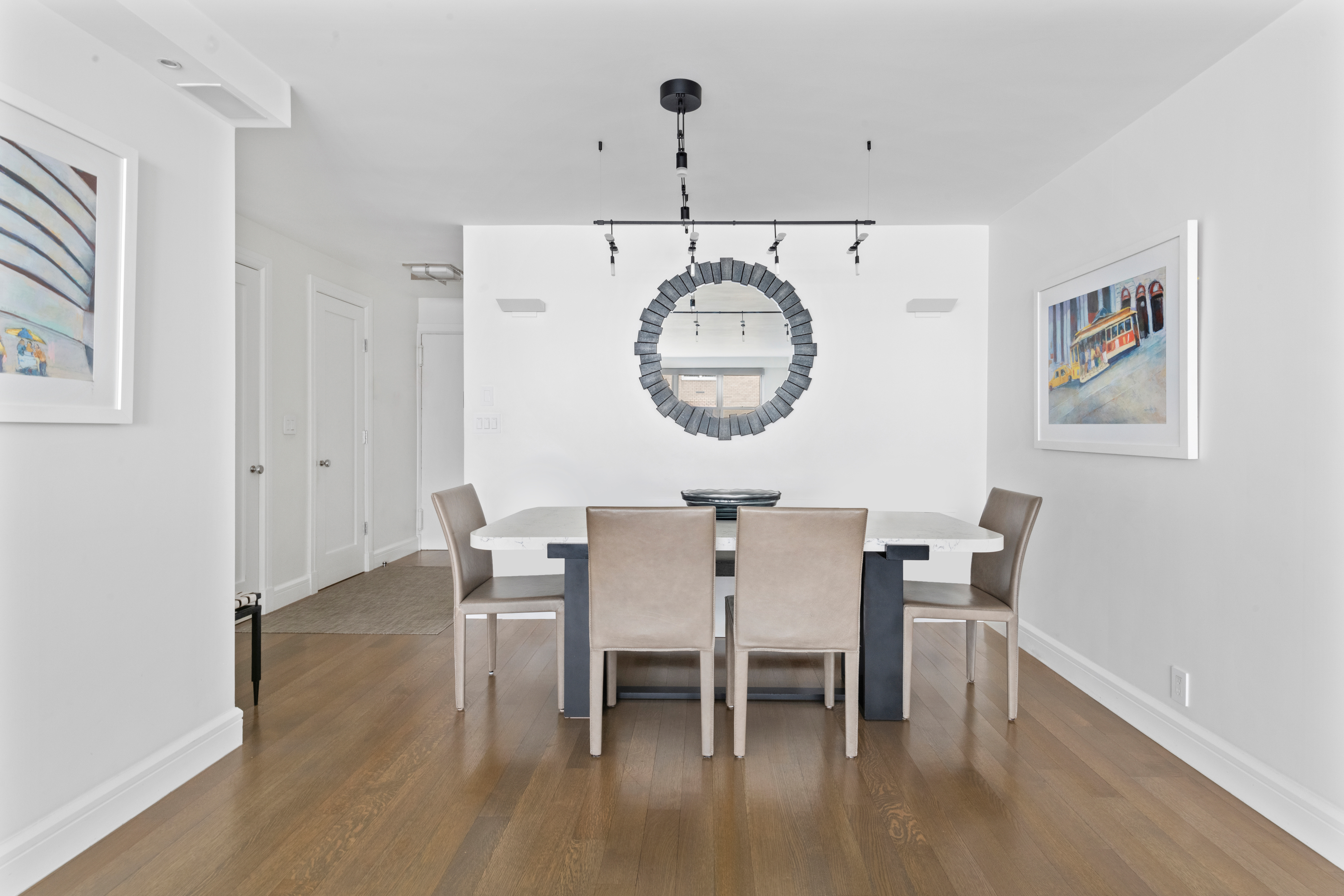 363 East 76th Street, Unit 7C Manhattan, NY 10021 - Photo 6 of 19 a view of a dining room with furniture and wooden floor