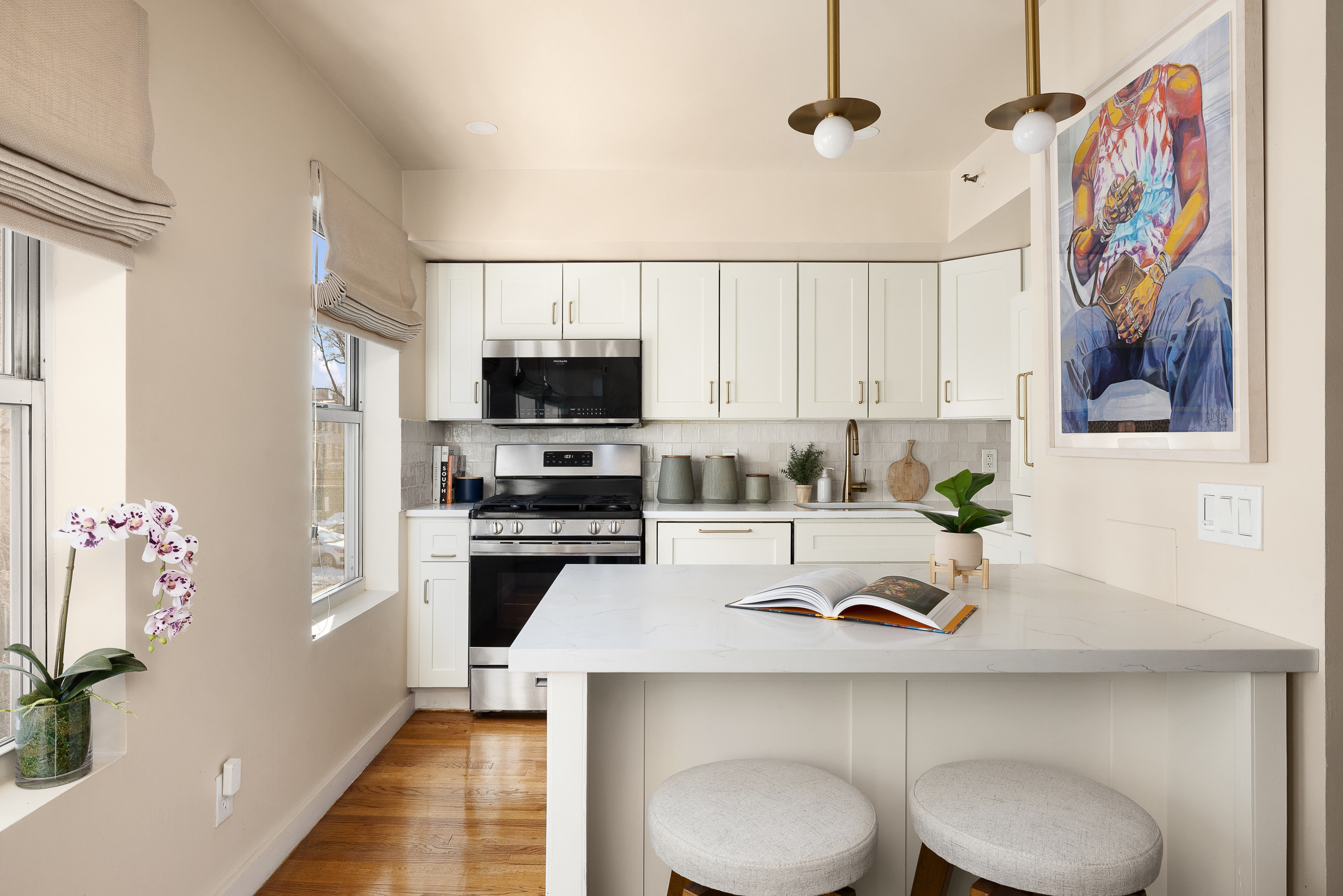 325 Grand Avenue, Unit A Brooklyn, NY 11238 - Photo 5 of 10 a kitchen with a sink a window a dining table and chairs