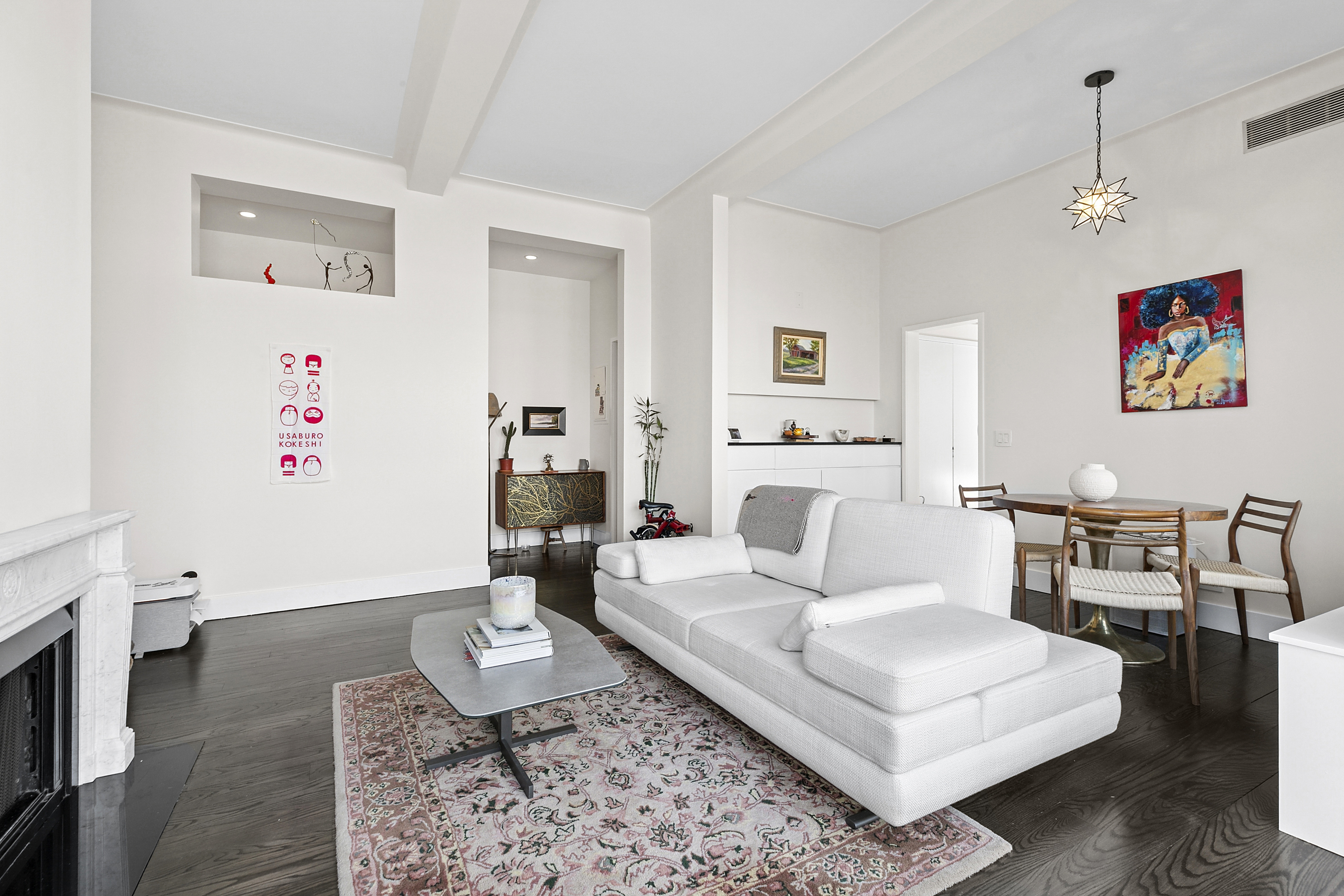 310 West 106th Street, Unit PH17B Manhattan, NY 10025 - Photo 7 of 9 a living room with furniture and wooden floor