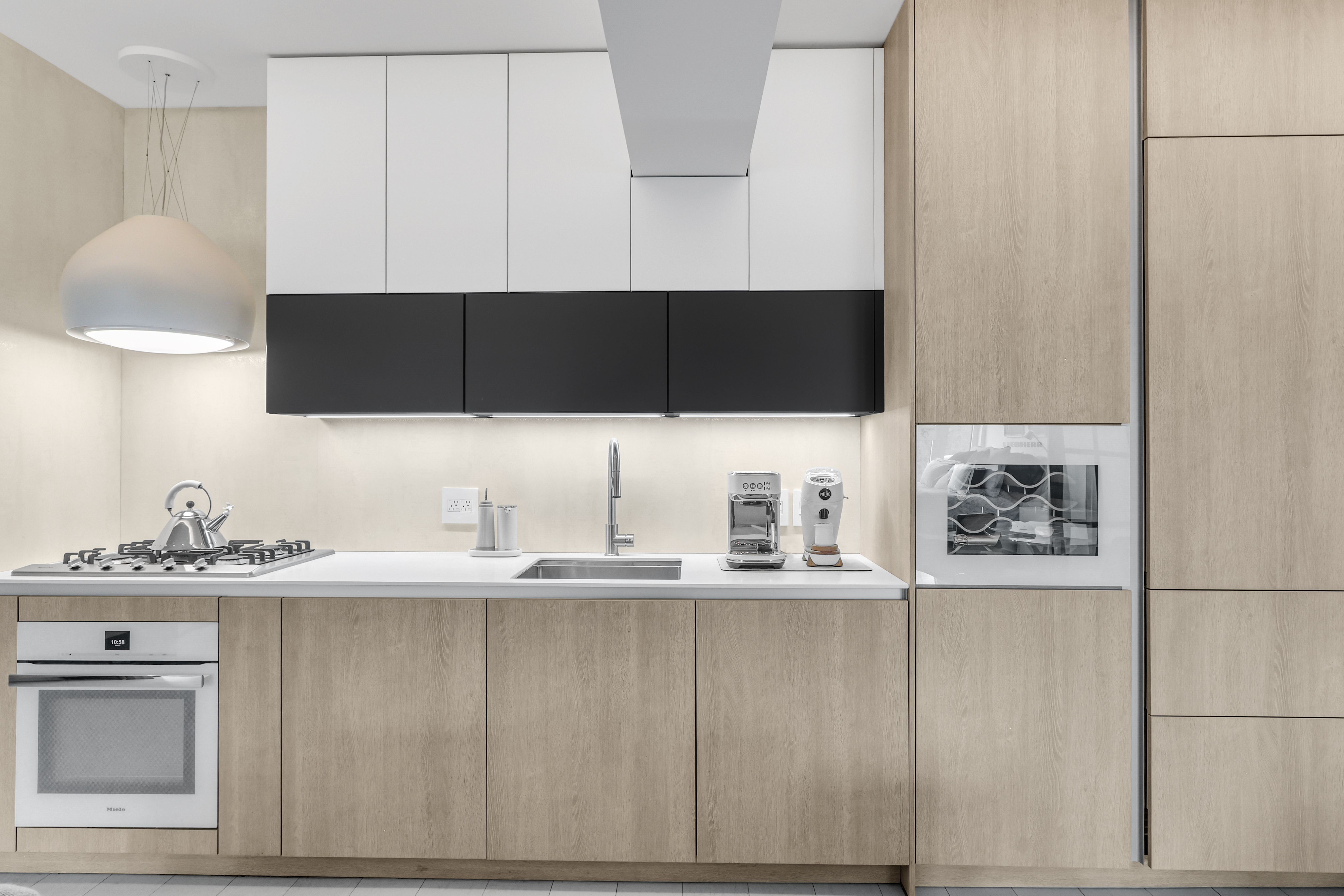 120 Central Park South, Unit 2 B C Manhattan, NY 10019 - Photo 8 of 13 a kitchen with a sink and cabinets