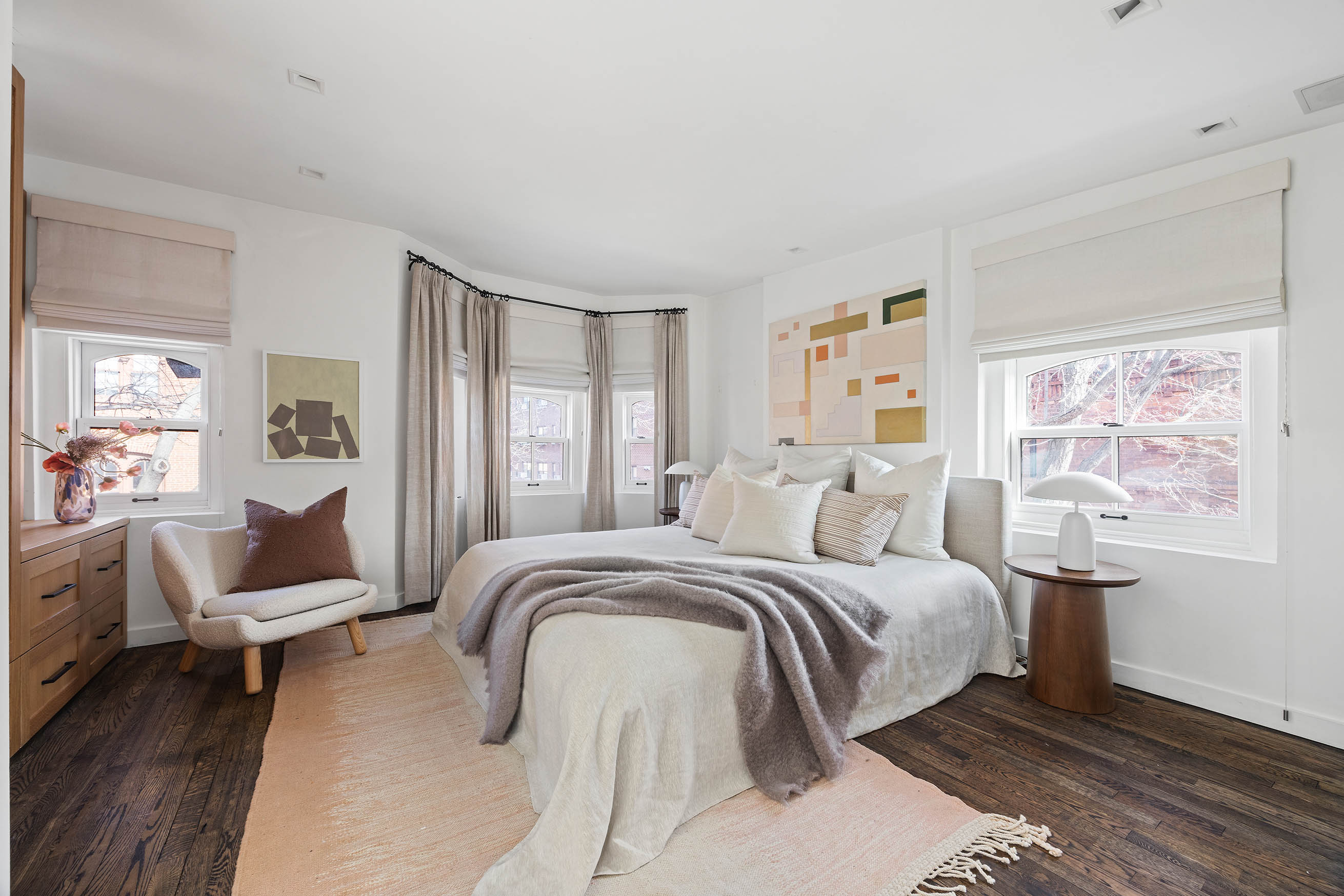 148 Warren Street Brooklyn, NY 11201 - Photo 16 of 20 a spacious bedroom with a bed and a couch