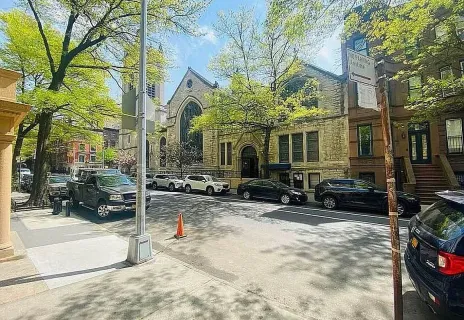 a view of a building with sitting area