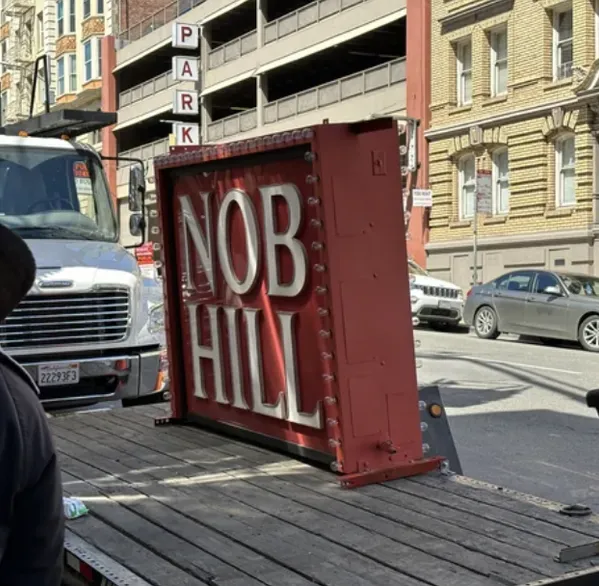a car parked in front of a building
