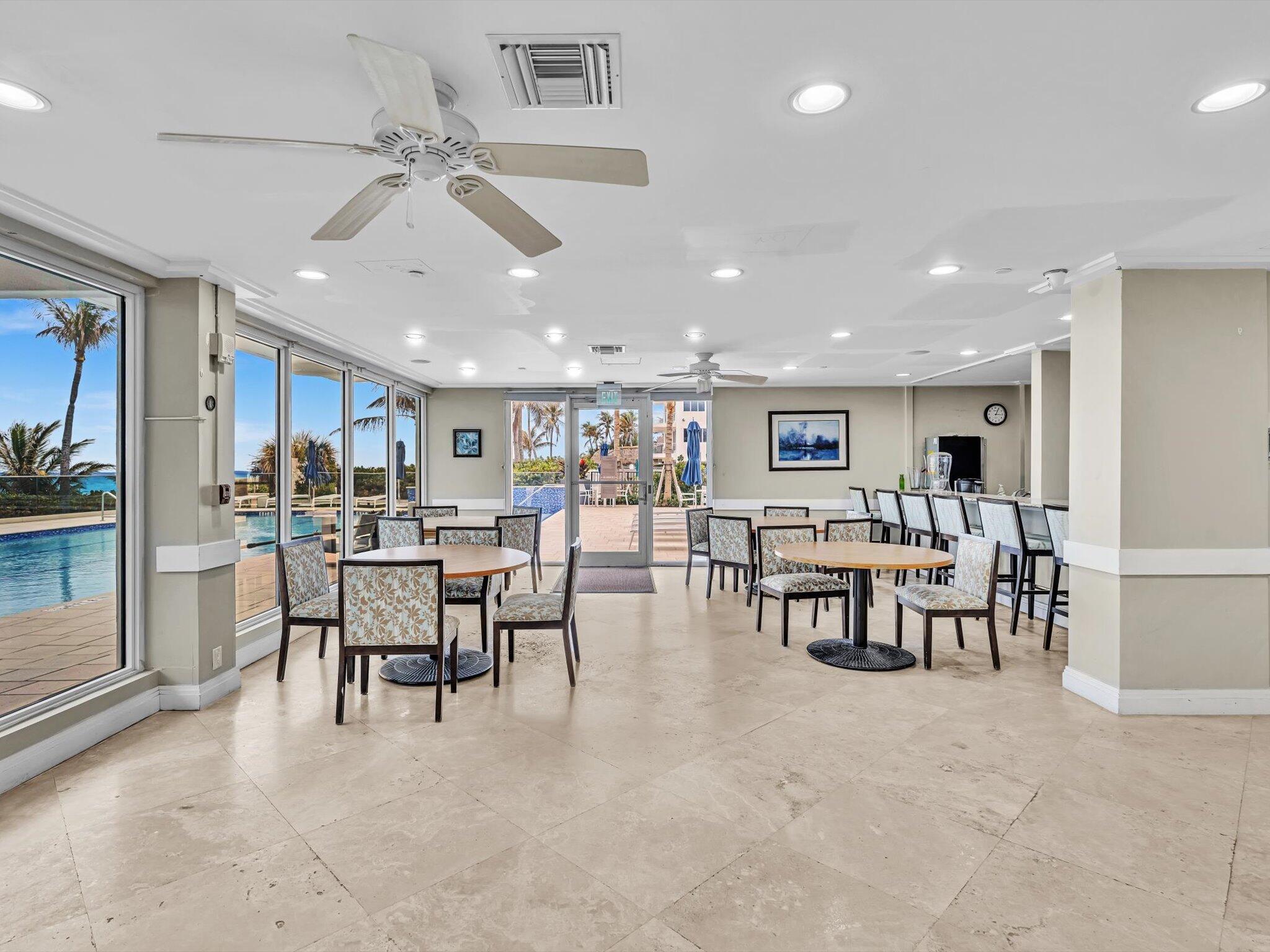 3000 South Ocean Boulevard, Unit 1504 Boca Raton, FL 33432 - Photo 41 of 64 a view of a dining area with furniture and a chandelier