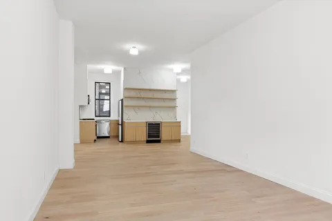 a view of a room with a flat screen tv