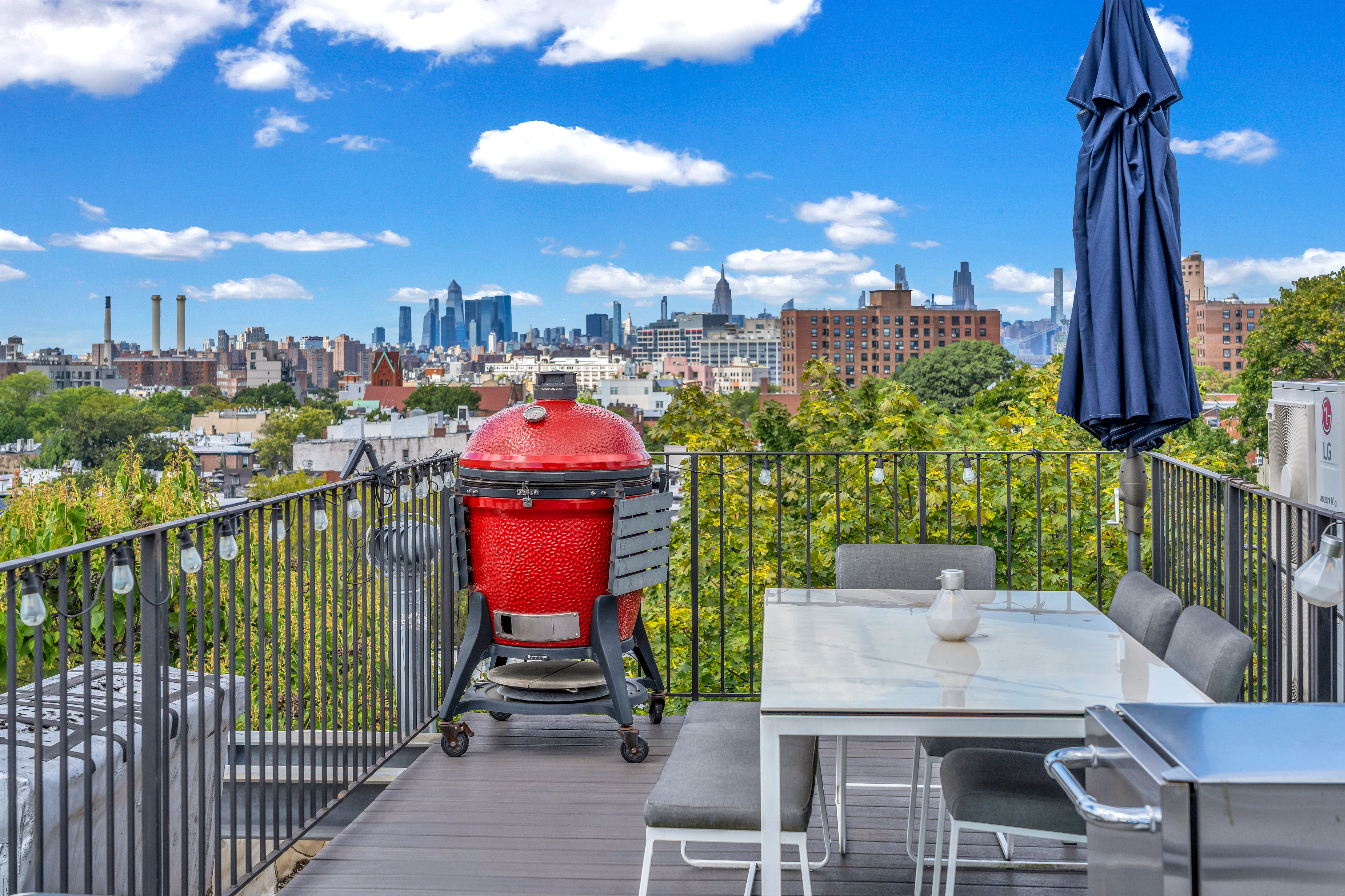 215 Lafayette Avenue, Unit C Brooklyn, NY 11238 - Photo 13 of 17 a view of a balcony with furniture and a potted plant