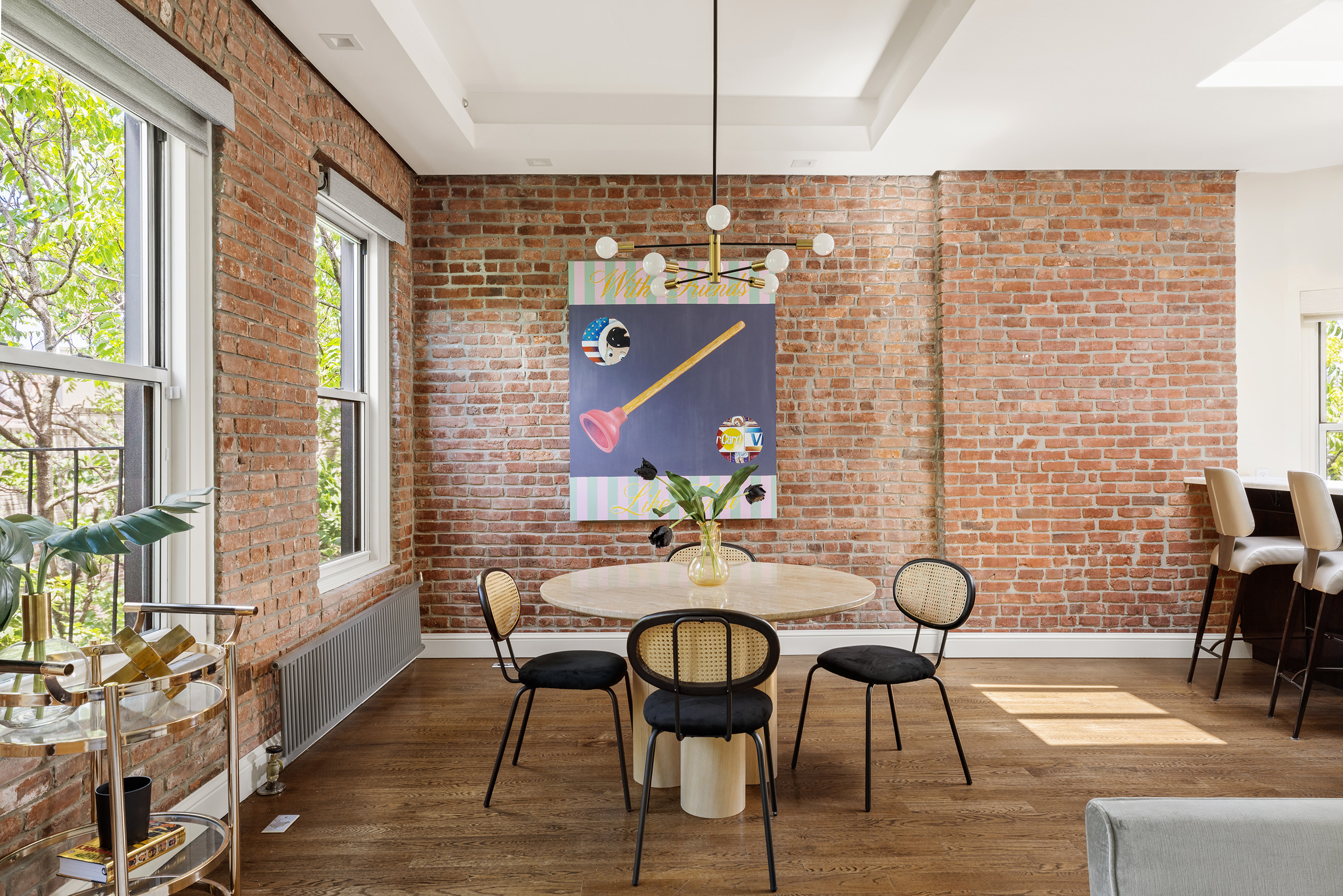 77 Perry Street, Unit 6CD Manhattan, NY 10014 - Photo 2 of 16 a view of a dining room with furniture and wooden floor