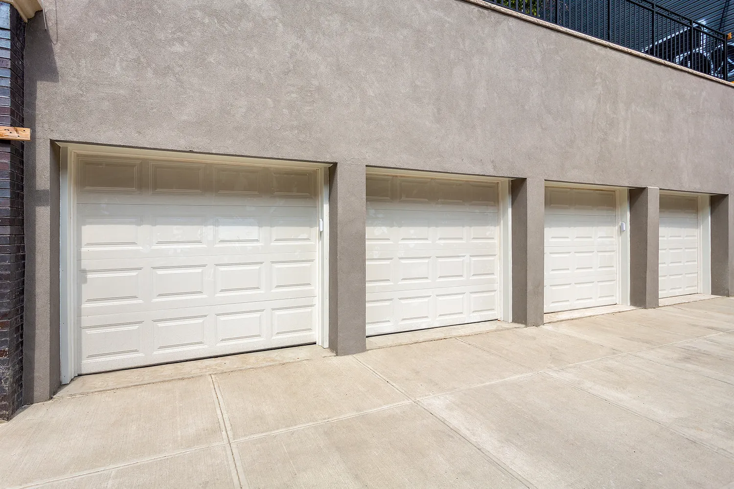 a view of an empty room with cabinet and utility room