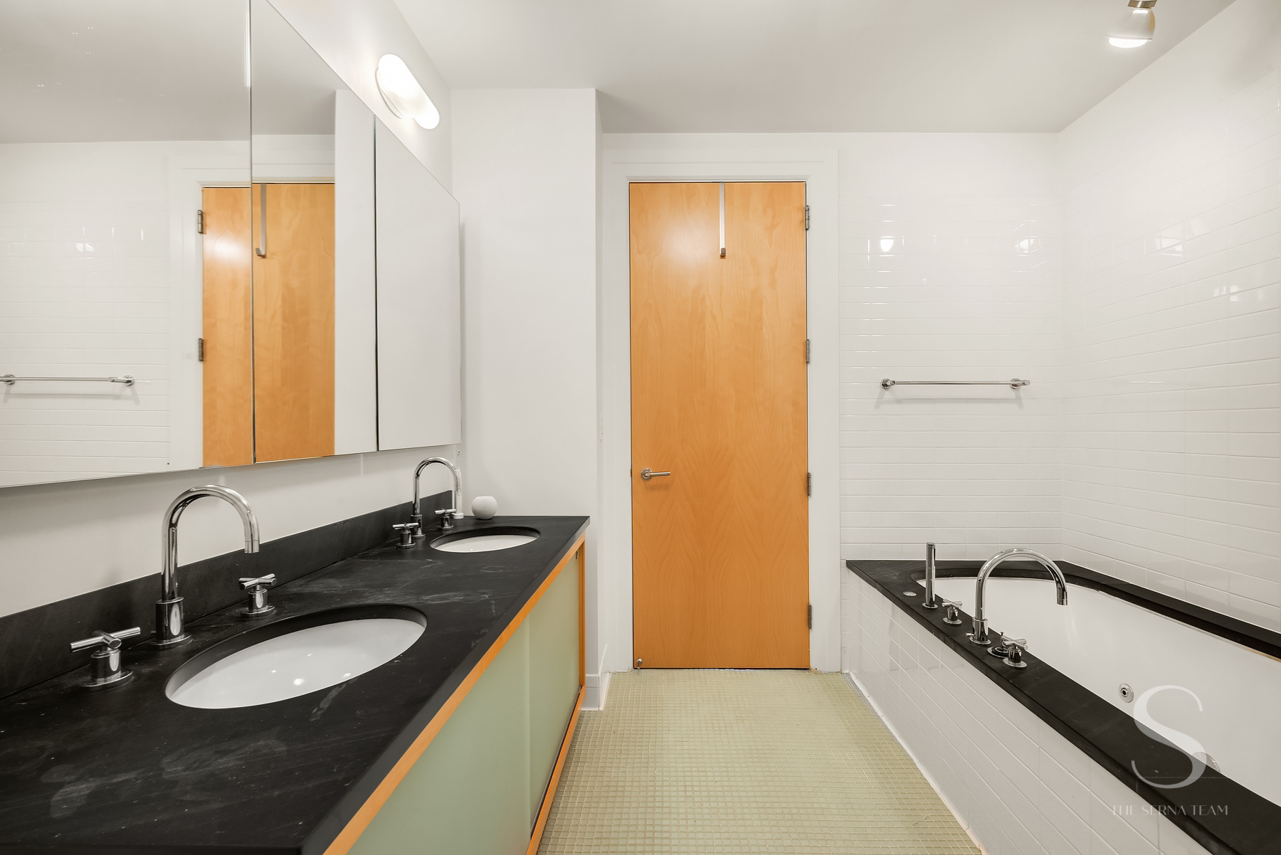 70 Washington Street, Unit 8H Brooklyn, NY 11201 - Photo 11 of 15 a bathroom with a sink and a mirror