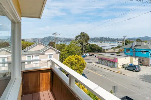 a view of a balcony with an ocean view