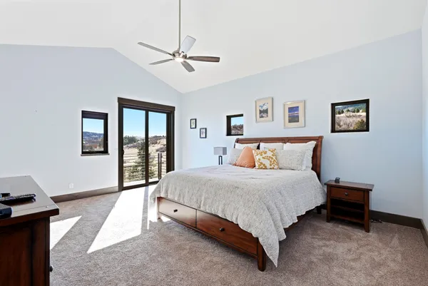 a room with furniture pool table and flat screen tv