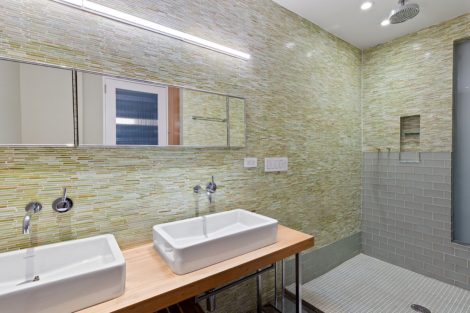 198 6th Avenue Manhattan, NY 10013 - Photo 13 of 45 a bathroom with a sink and a mirror