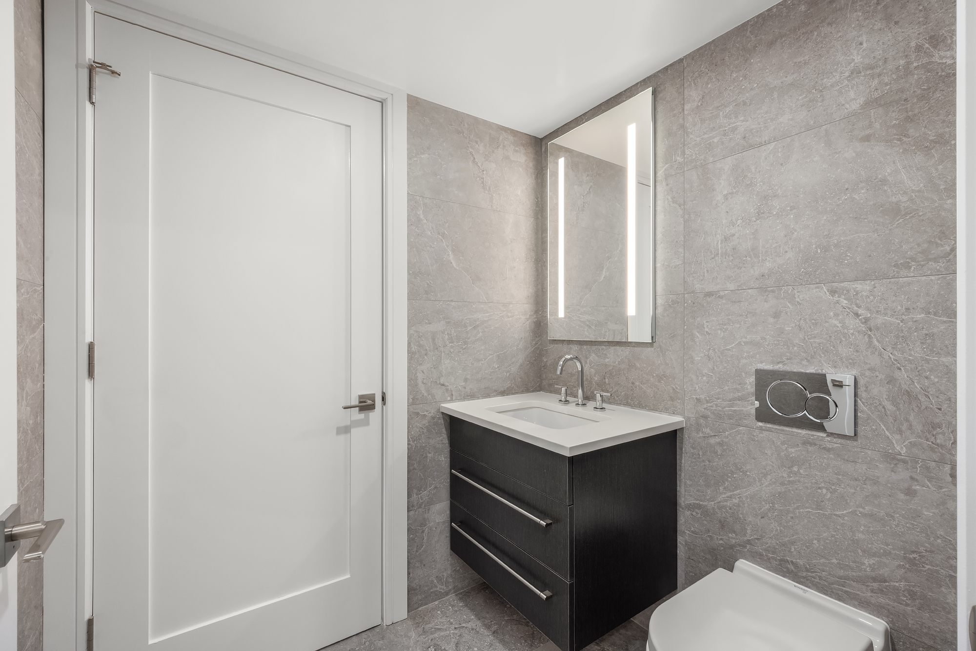45 Garnet Street, Unit 1A Brooklyn, NY 11231 - Photo 12 of 13 a bathroom with a sink a toilet and mirror