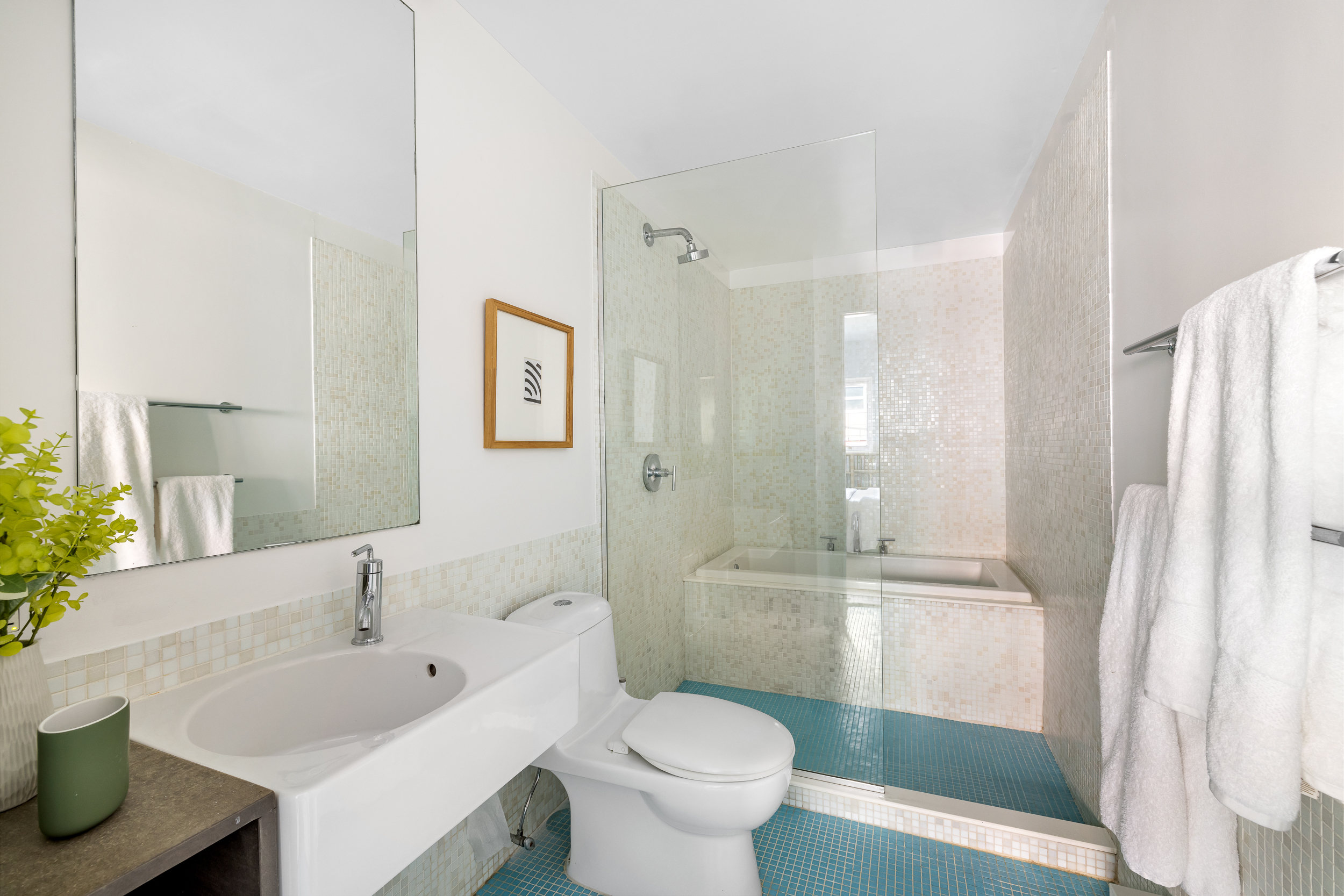361 Manhattan Avenue, Unit 3AB Brooklyn, NY 11211 - Photo 9 of 21 a bathroom with a sink toilet and shower