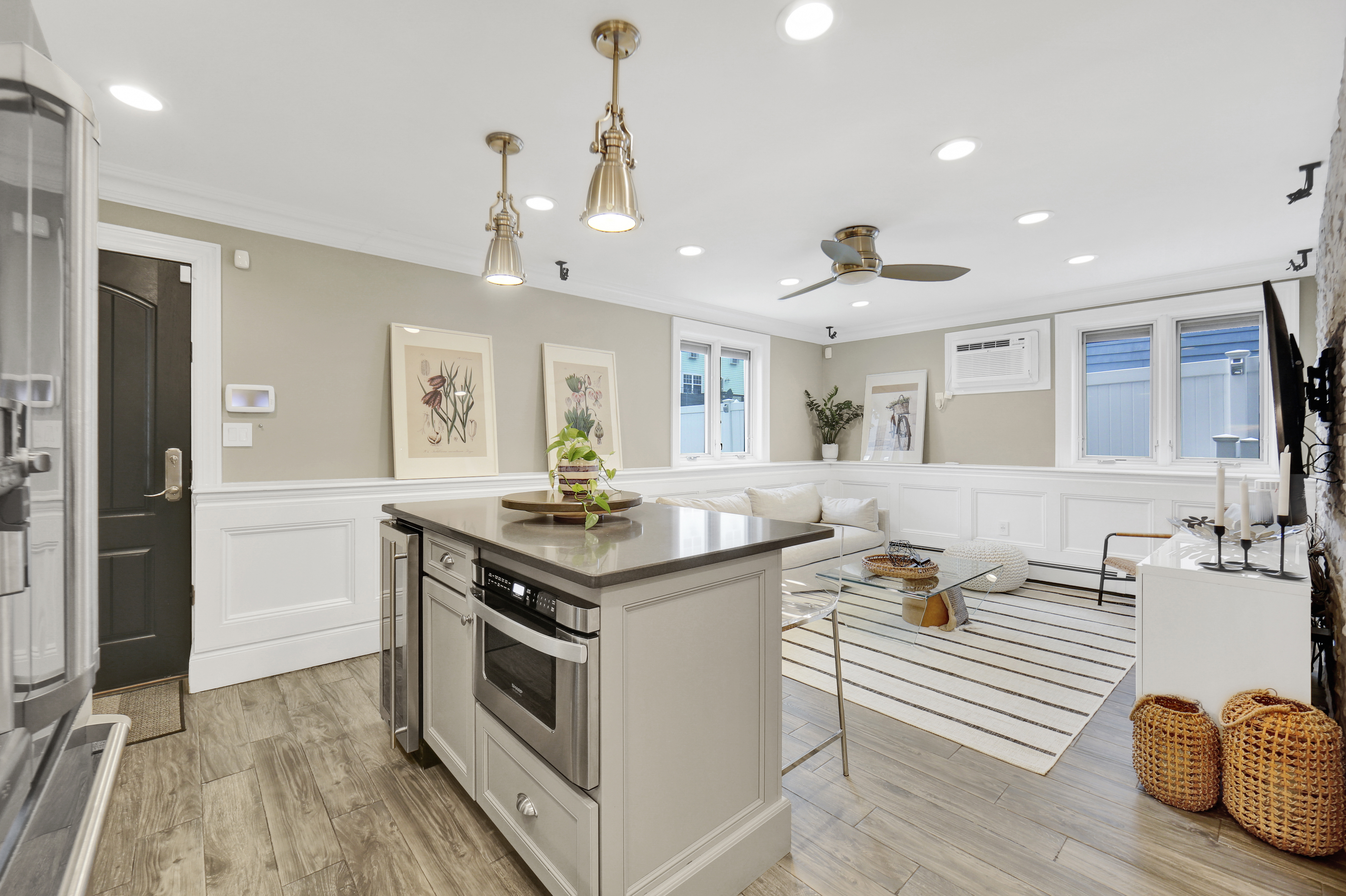 1-69 Beach 98th Street, Unit 1 Queens, NY 11694 - Photo 10 of 23 a kitchen with stainless steel appliances granite countertop a sink and stove