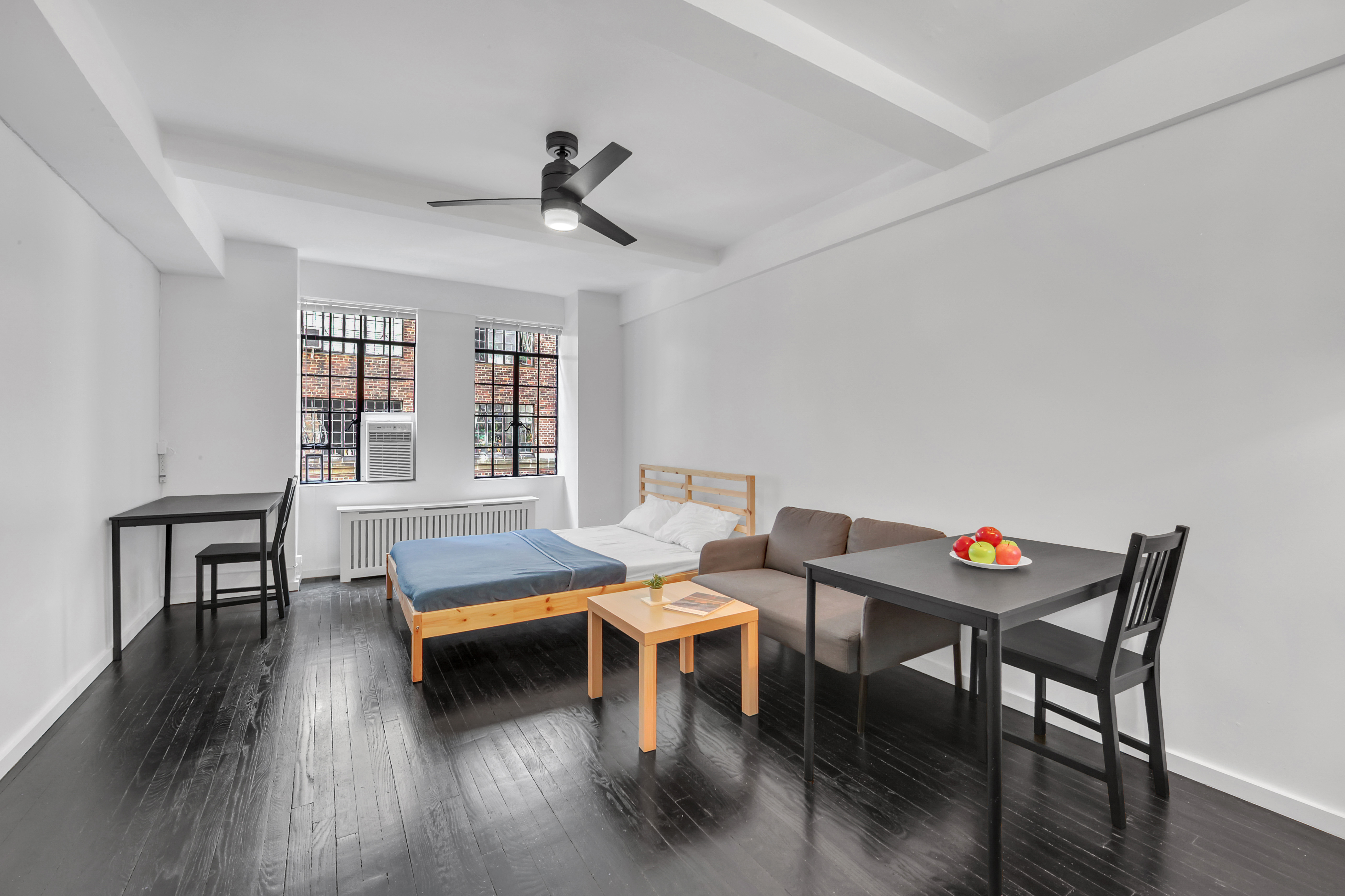 a living room with furniture and a window