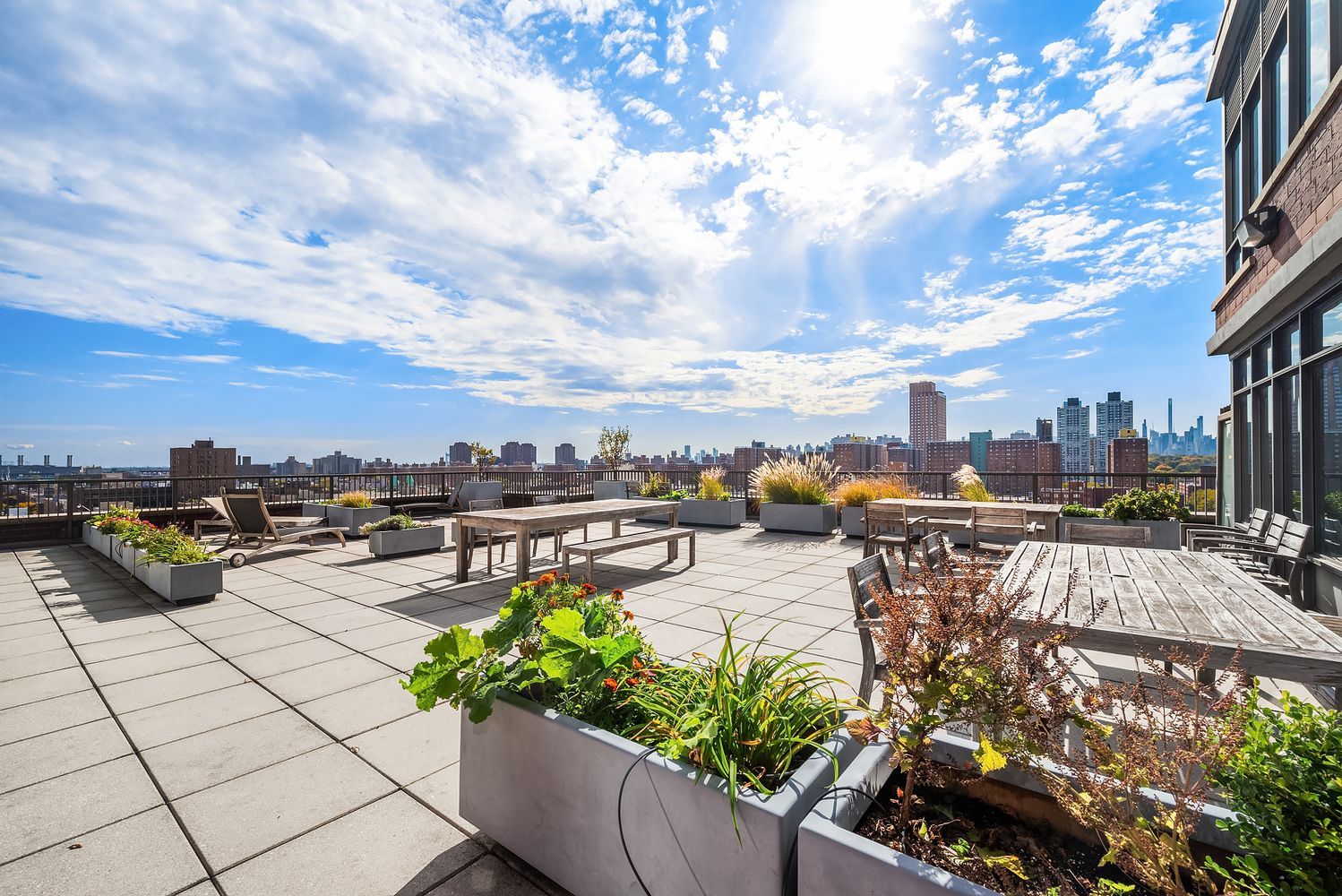 1485 5th Avenue, Unit 12G Manhattan, NY 10035 - Photo 12 of 14 a view of a terrace with chairs