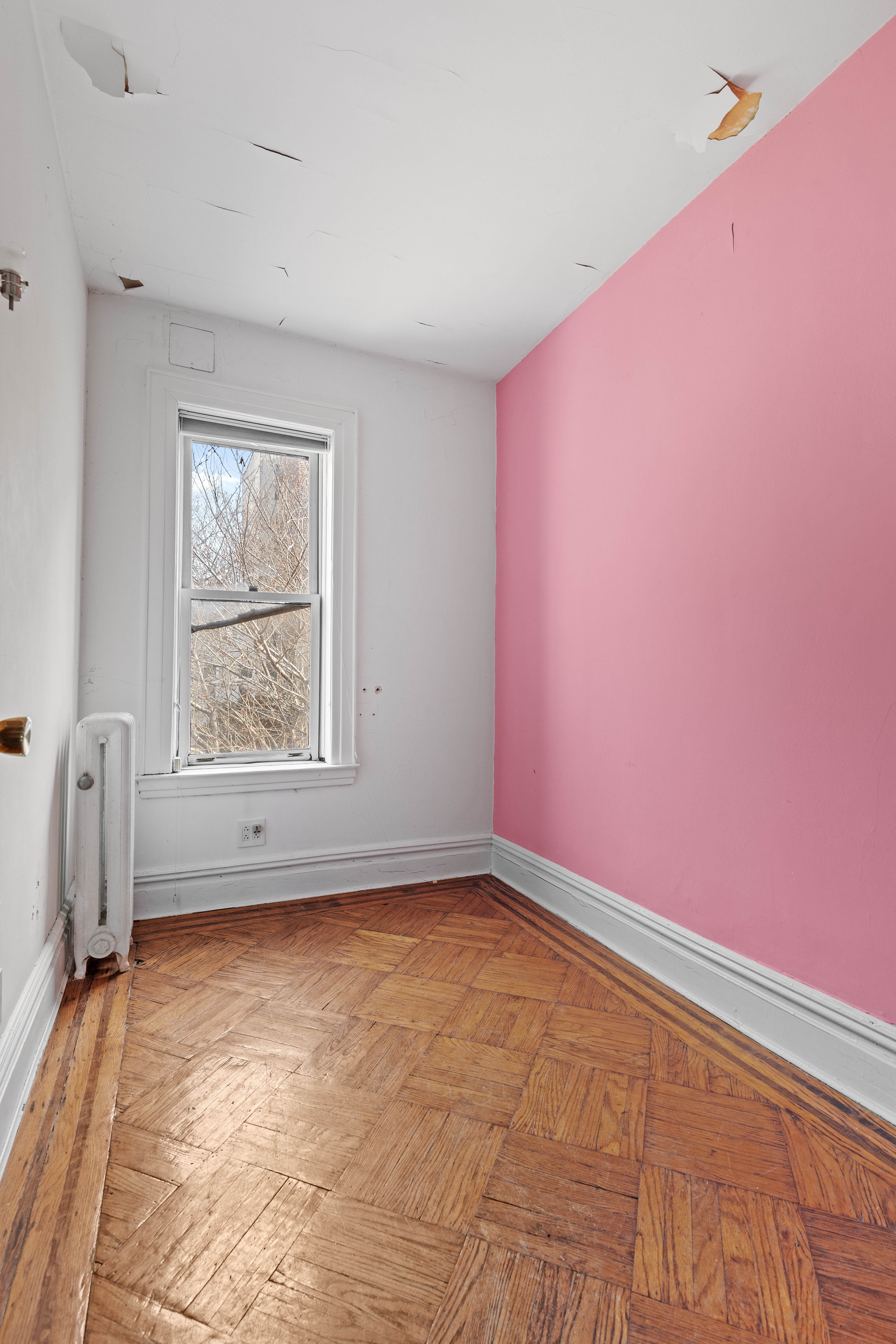 555 16th Street Brooklyn, NY 11215 - Photo 16 of 19 an empty room with a window