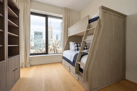 a view of bedroom and staircase