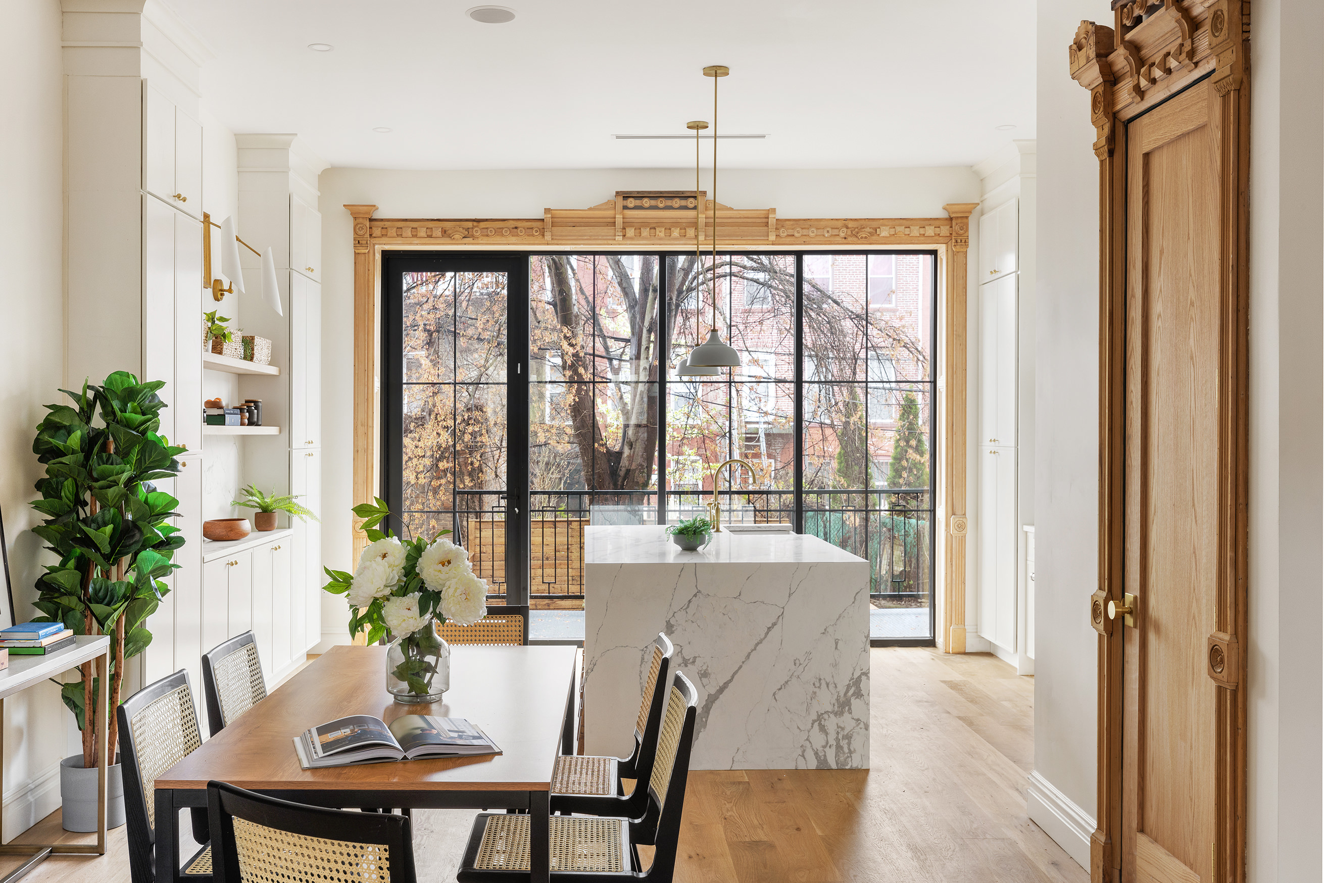 816 Lafayette Avenue, Unit MF Brooklyn, NY 11221 - Photo 5 of 22 a view of a dining room with furniture window and outside view